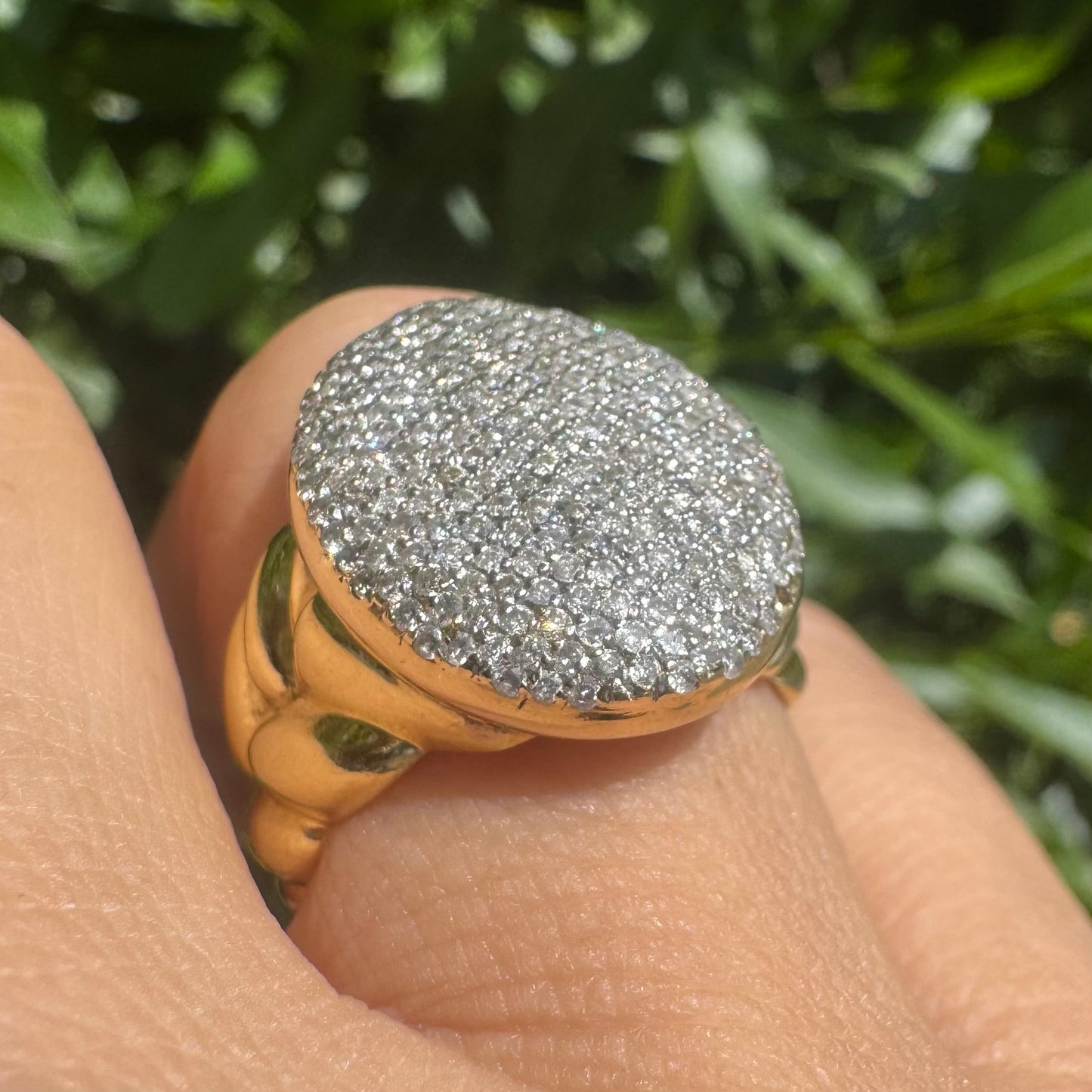 18K gold ring set with a dazzling dome of pavé-set diamonds