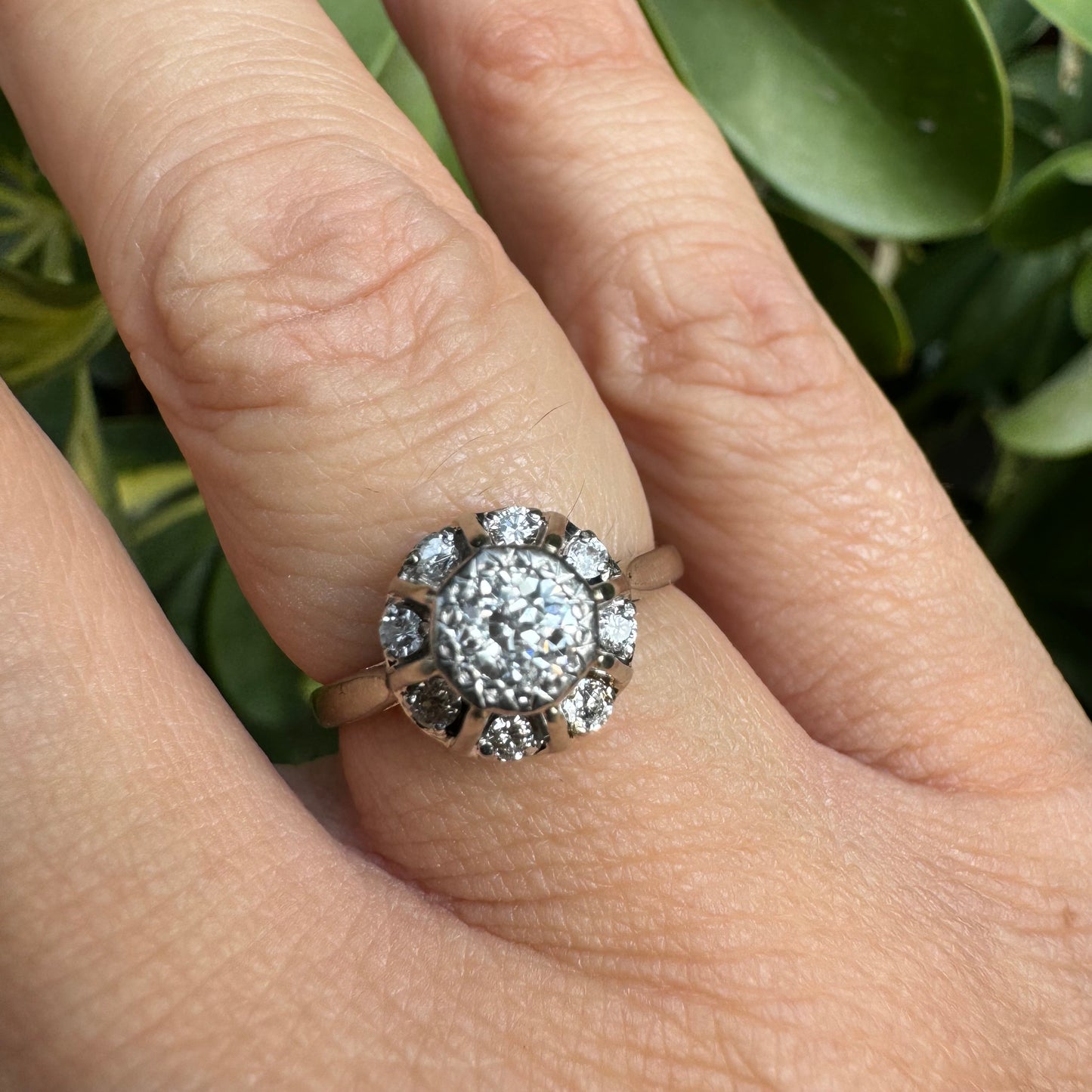 18K gold ring set with Diamonds in     a classic cluster-style