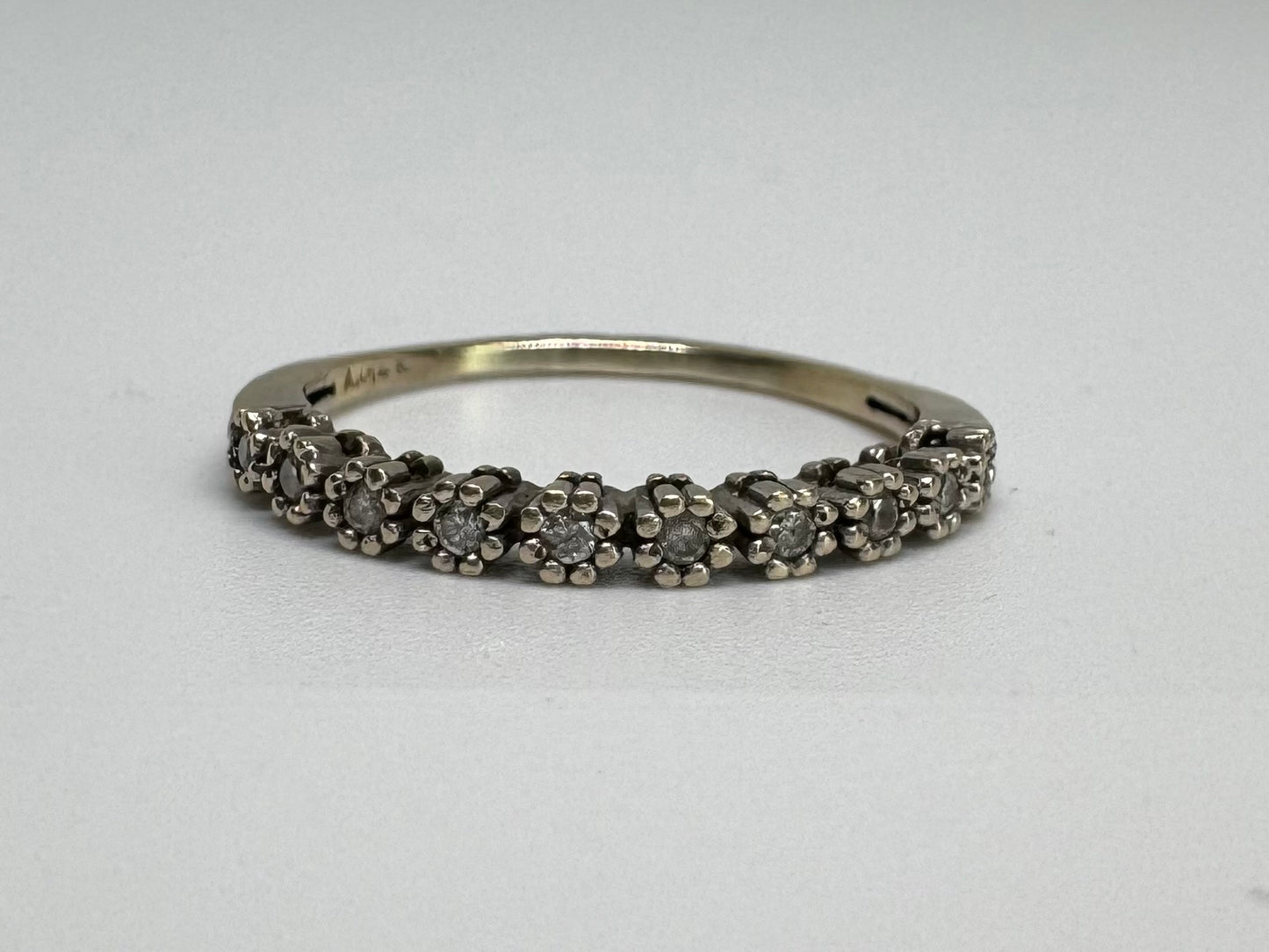 14K gold ring set with Diamonds