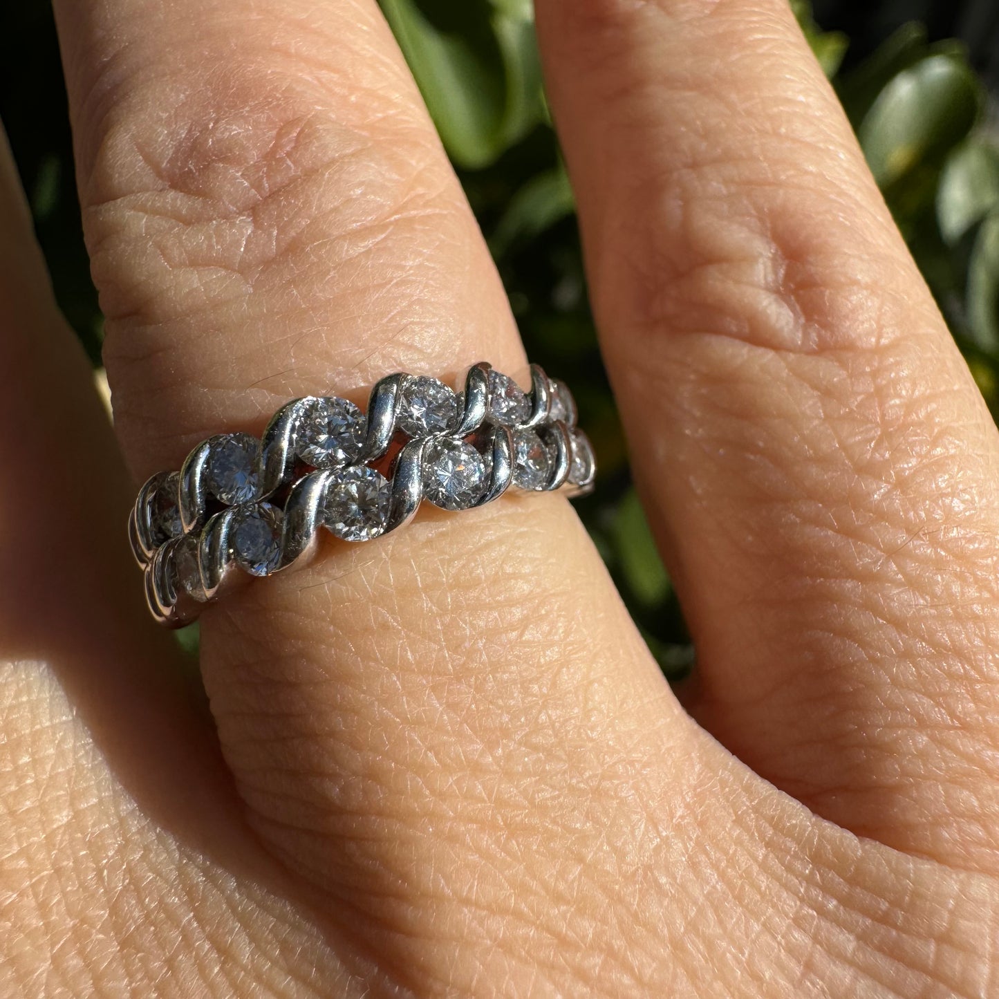 14K gold ring set with two rows of brilliant-cut Diamonds.