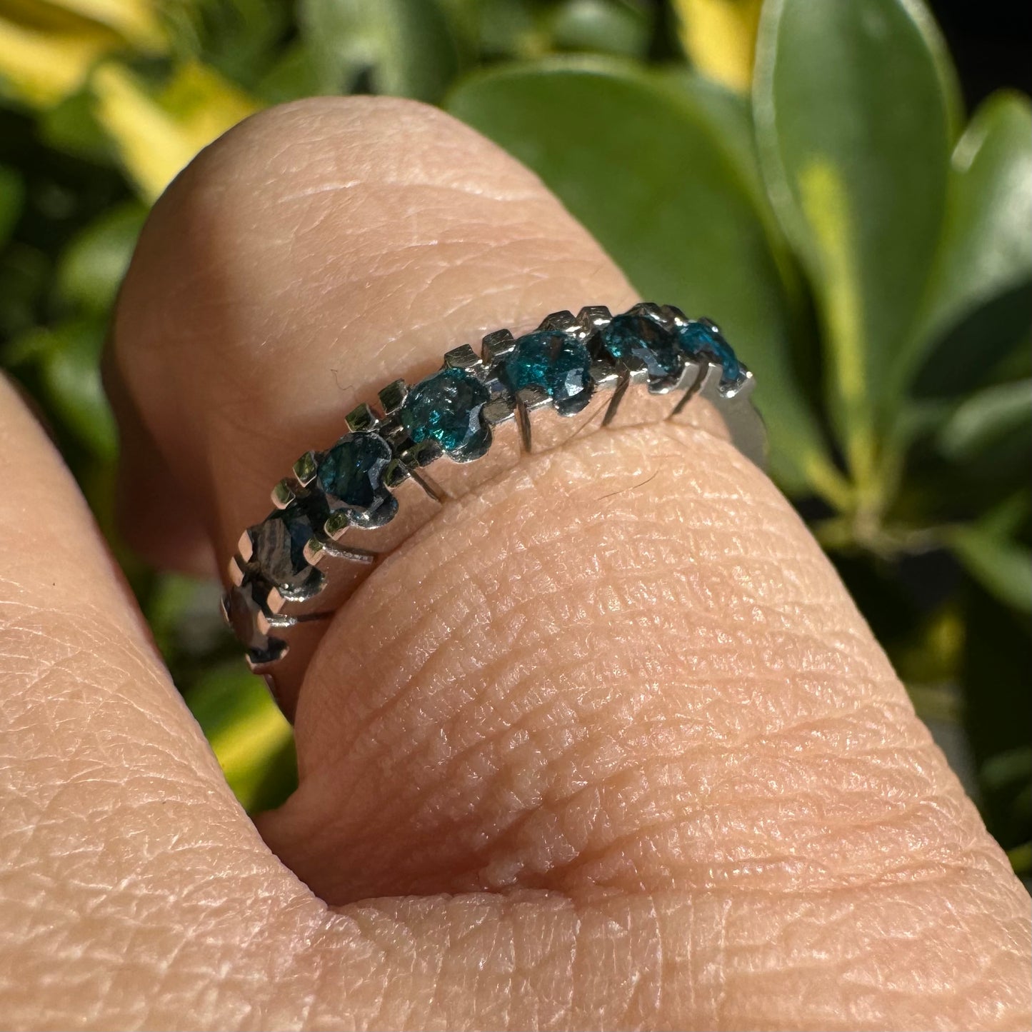 14K gold ring set with blue Diamonds