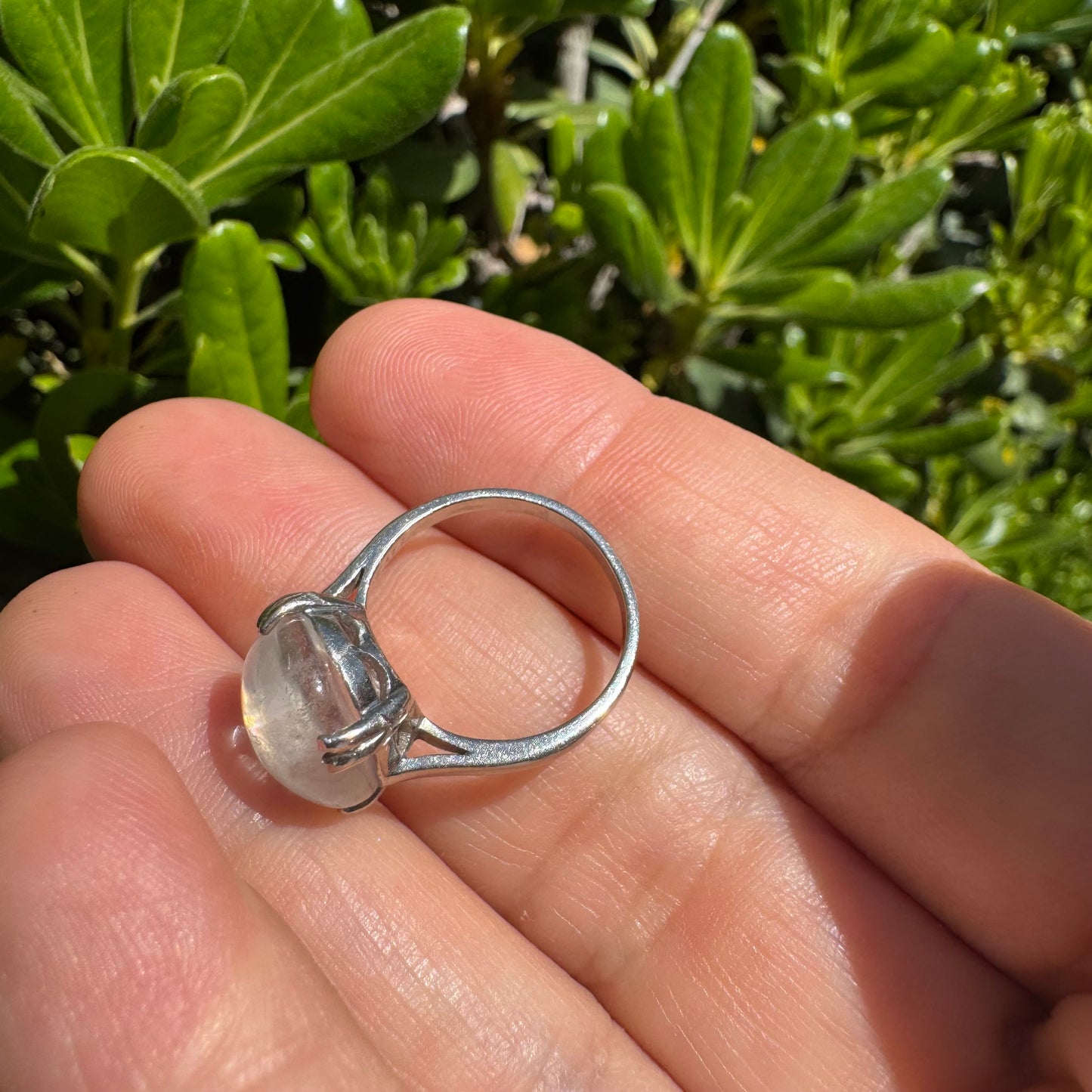 Palladium ring set with a large clear Rock Crystal cabochon.