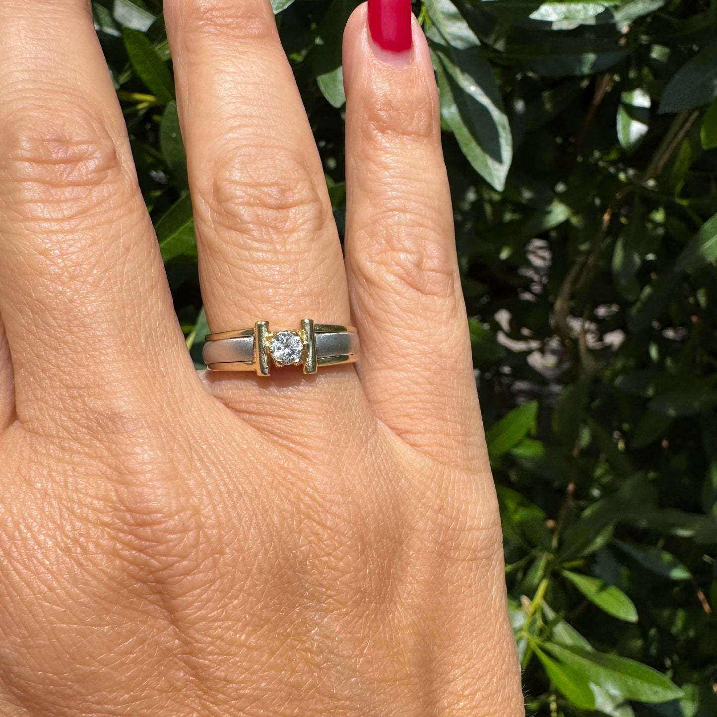 14K two-tone gold ring set with one center Diamond