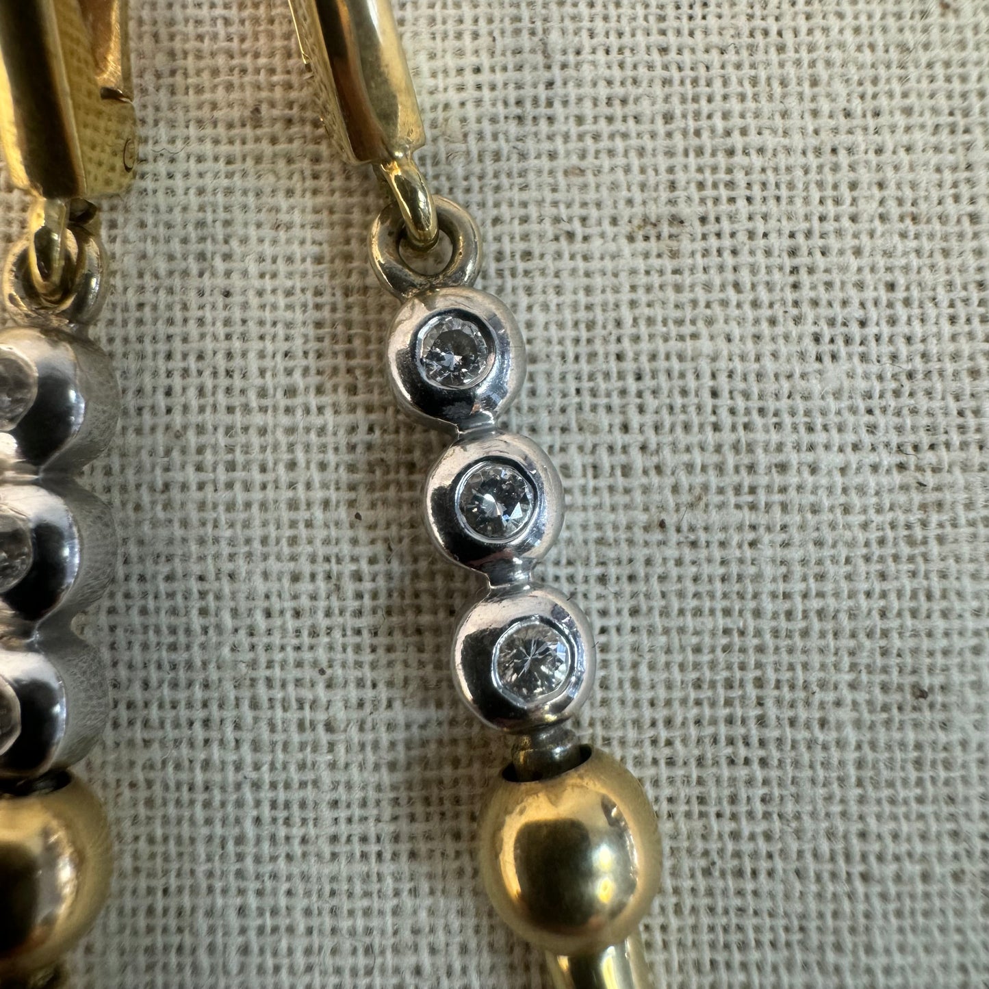 14K gold drop earrings set with Diamonds