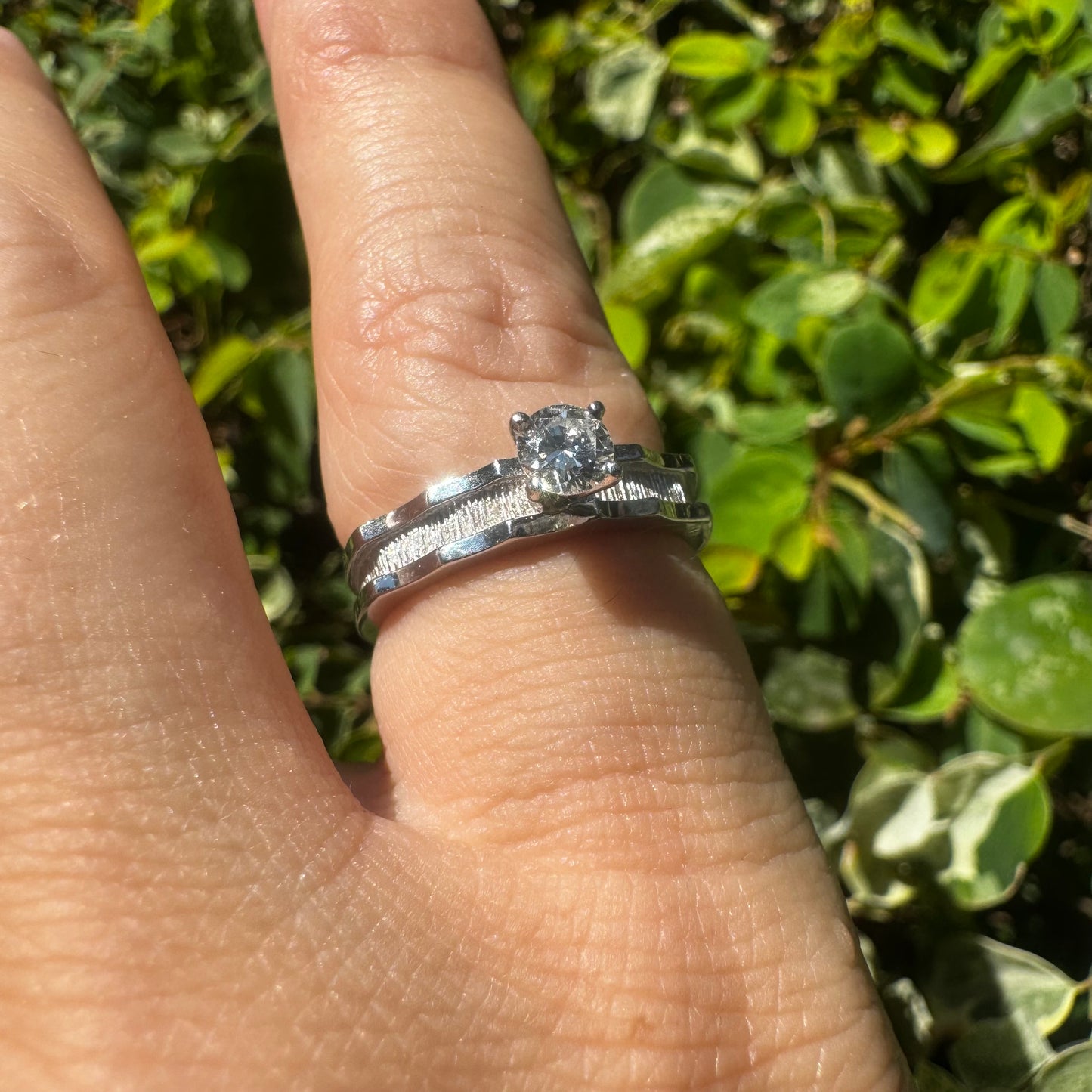 14K gold ring set with one center Diamond