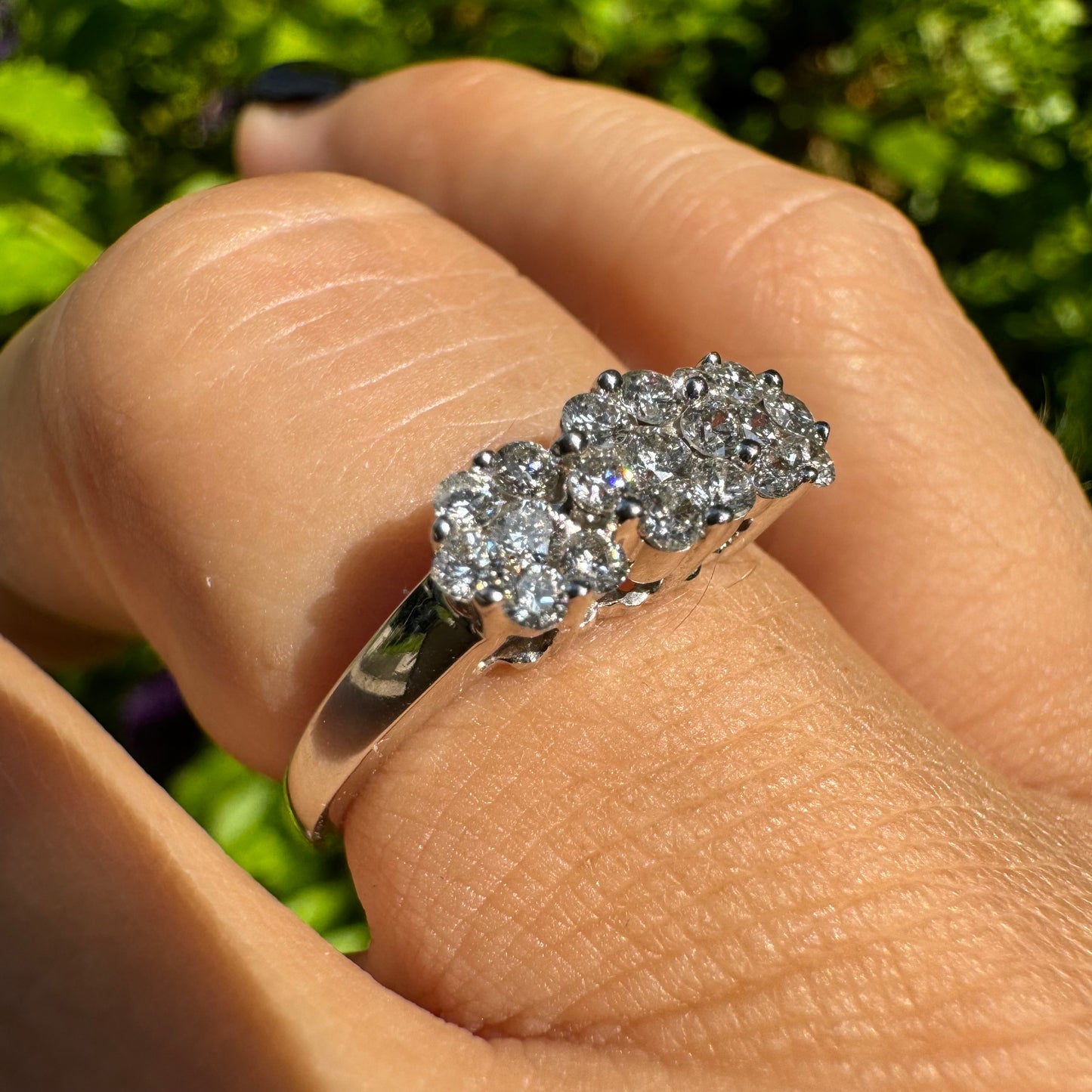 14K white gold ring set with clusters of brilliant white Diamonds