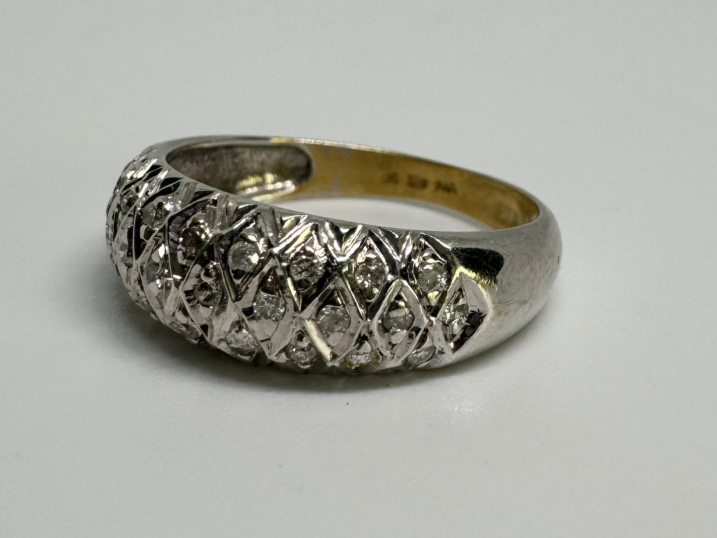 14K gold ring set with Diamonds