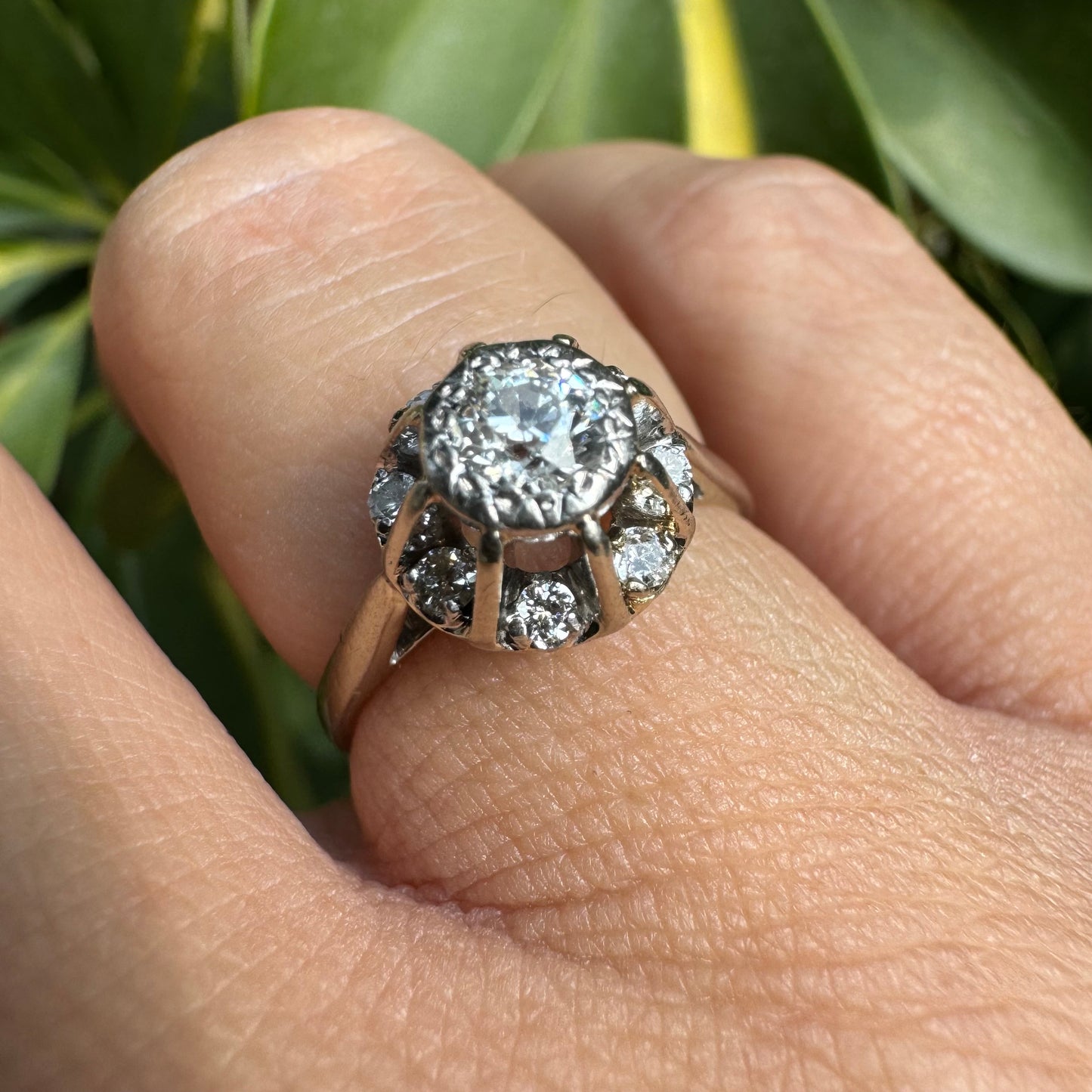 18K gold ring set with Diamonds in     a classic cluster-style