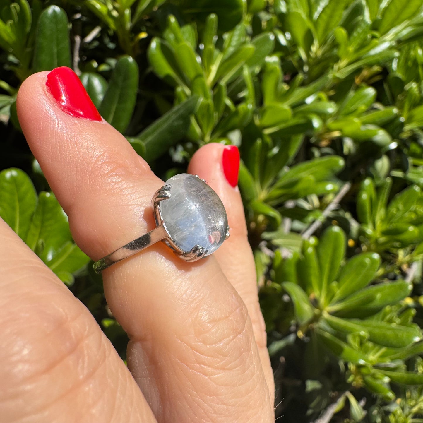 Palladium ring set with a large clear Rock Crystal cabochon.