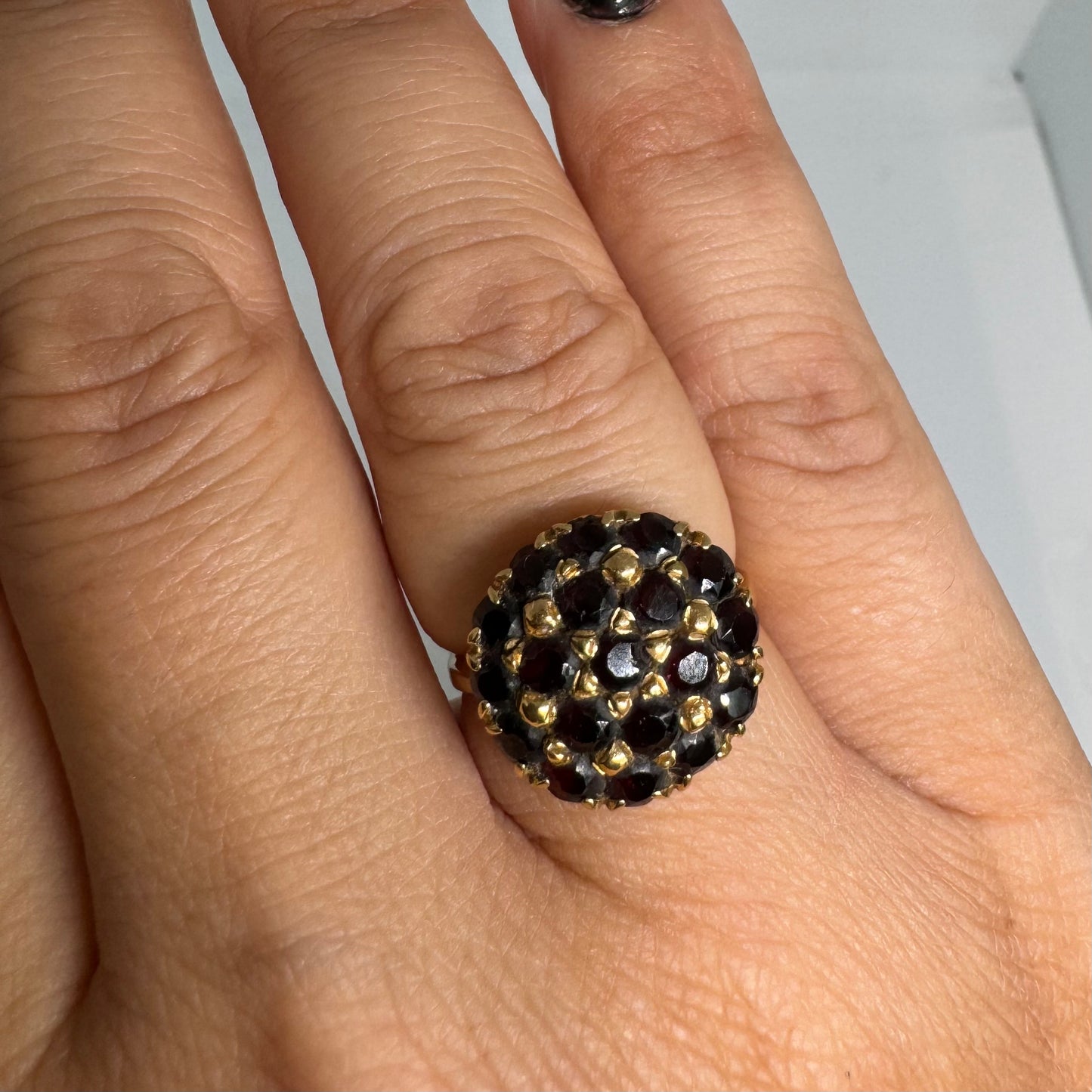 18K gold ring set with Garnets in rich gold prong settings