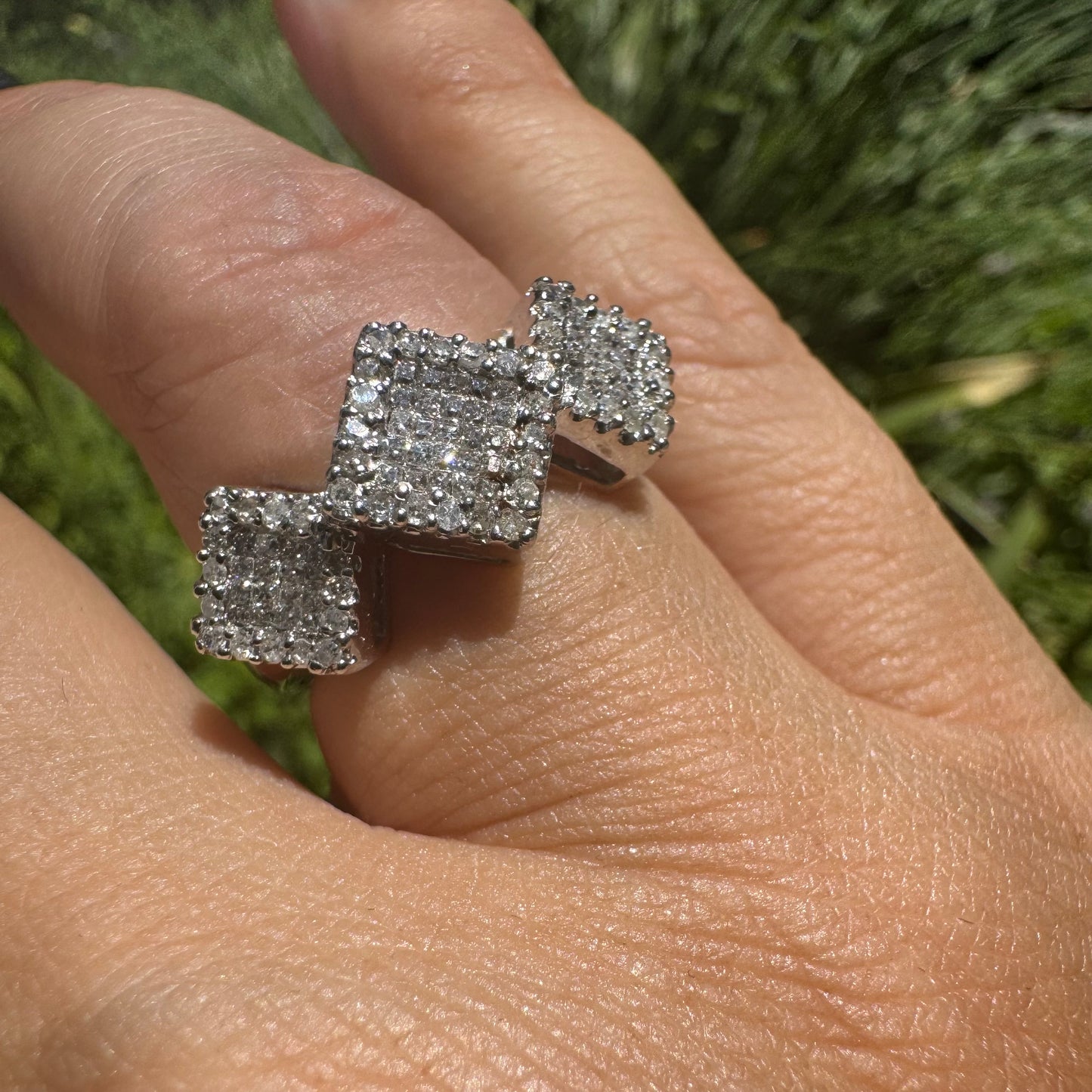 14K gold ring with three square clusters of sparkling Diamonds