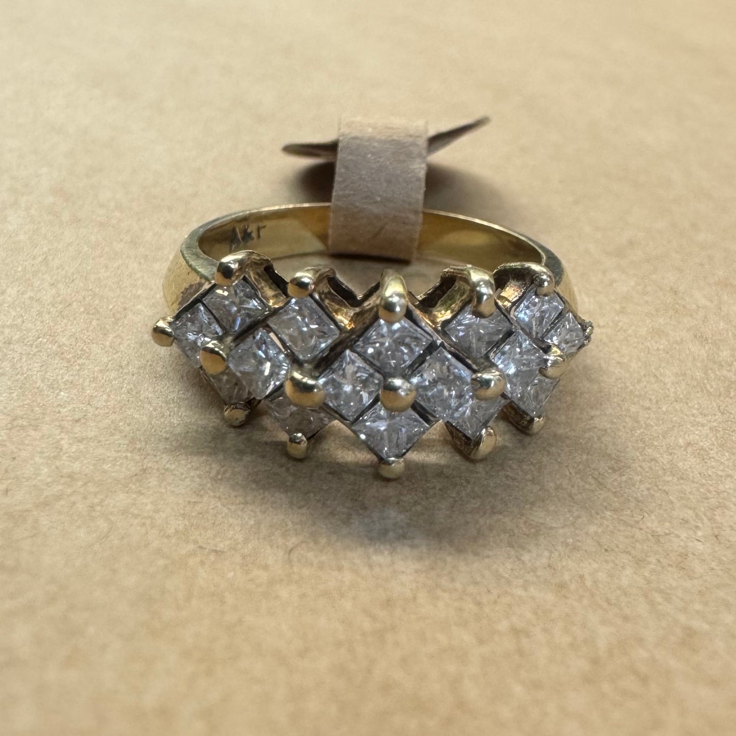 14K gold ring set with Diamonds in a criss-cross design
