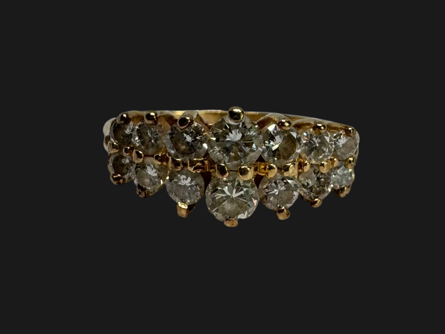 14K gold ring set with two dazzling rows of round-cut Diamonds