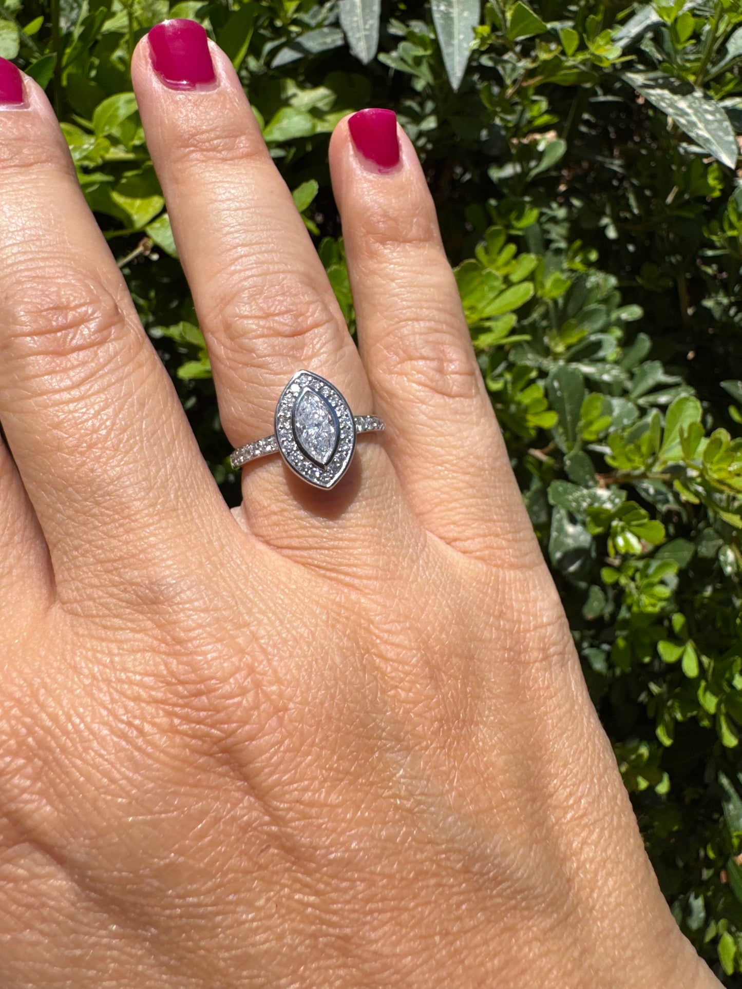 18K gold convertible ring set with two marquise-cut diamond halos that magnetically connect into a bold statement piece