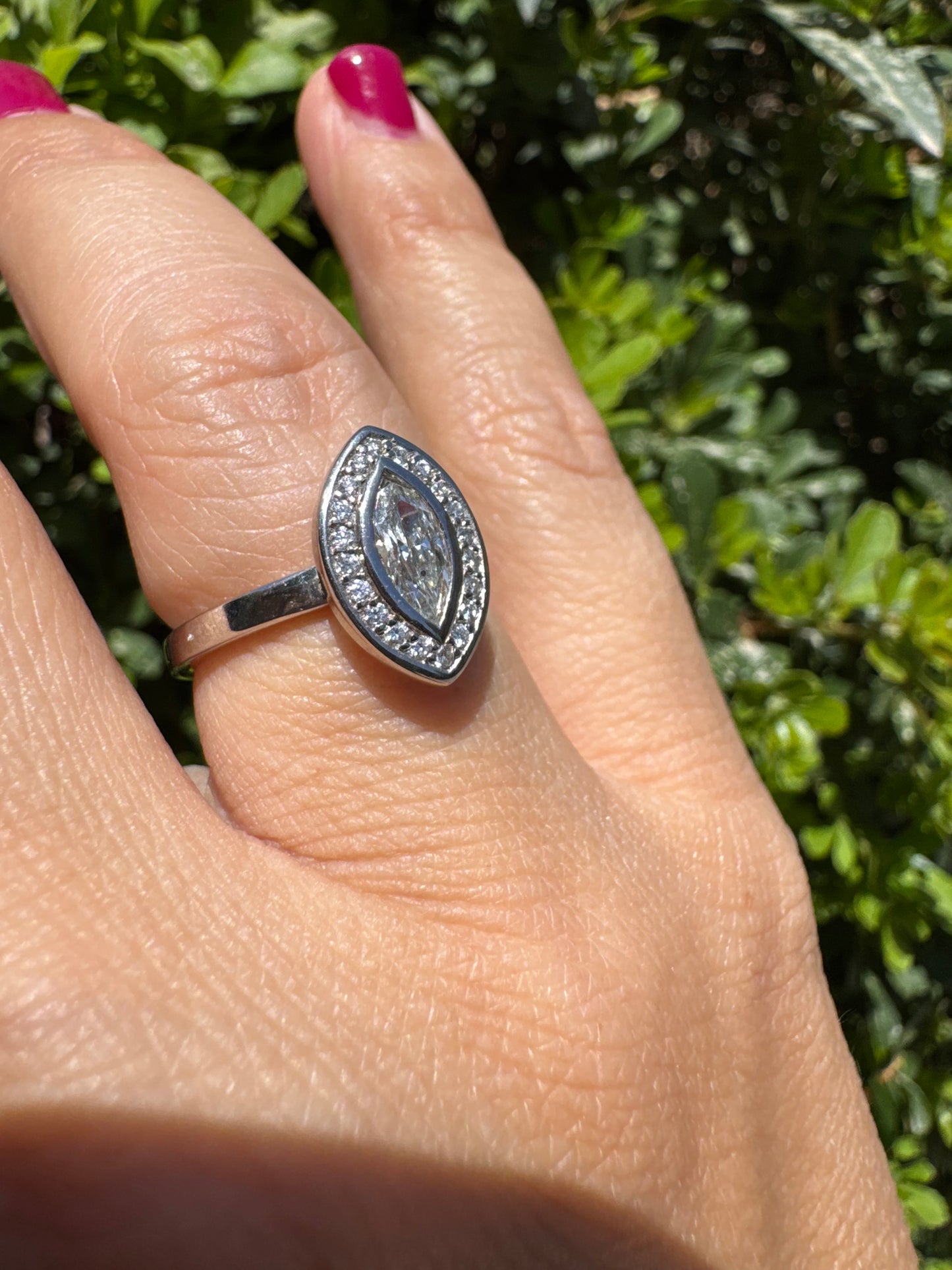 18K gold convertible ring set with two marquise-cut diamond halos that magnetically connect into a bold statement piece