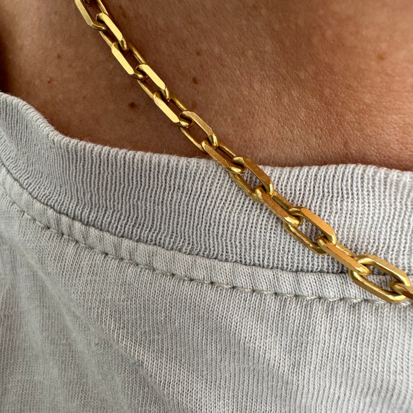 14K gold chain necklace featuring elegant elongated links with a polished finish.