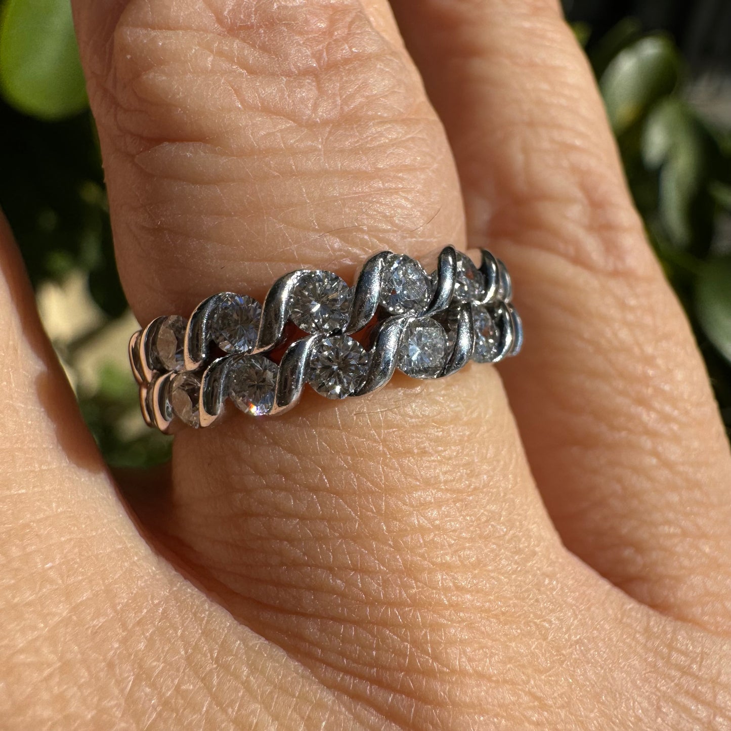 14K gold ring set with two rows of brilliant-cut Diamonds.