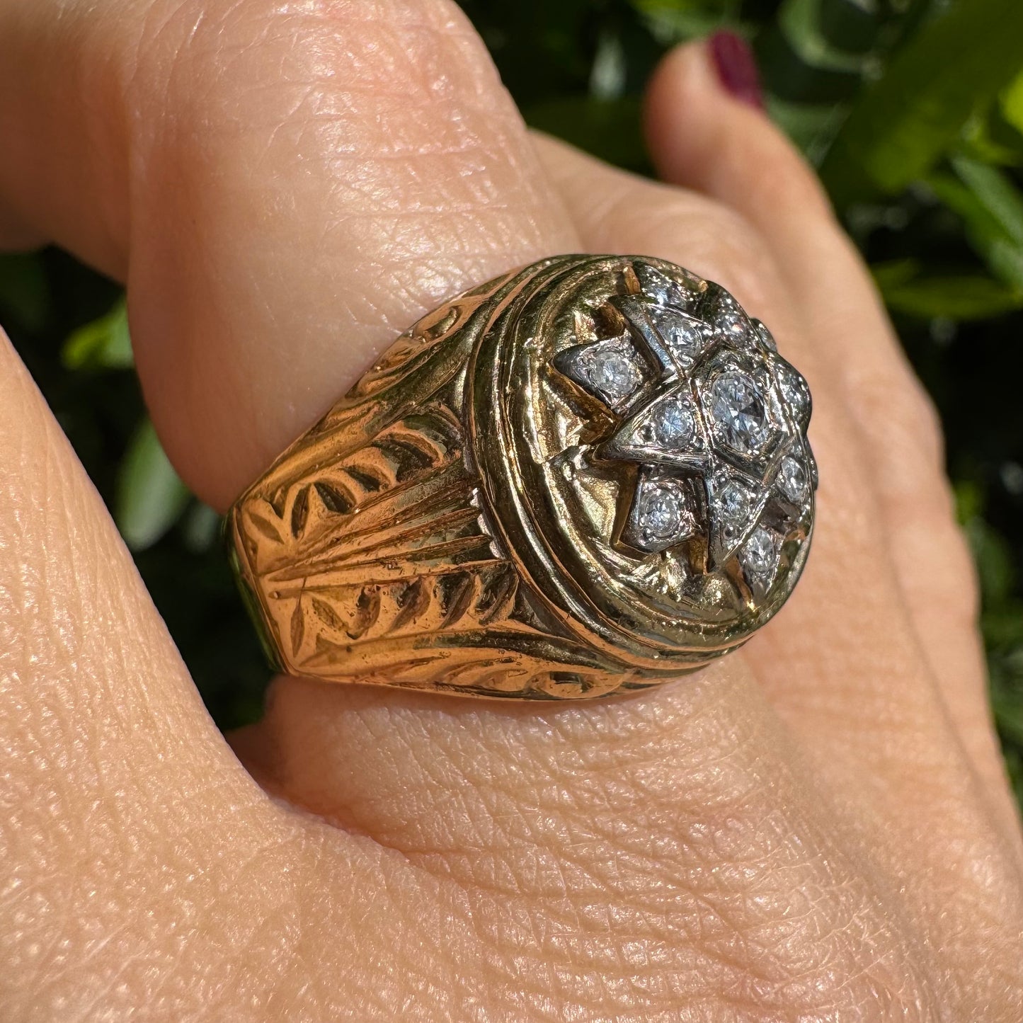 18K gold ring set with a dazzling double Star of David motif, meticulously set with shimmering Diamonds