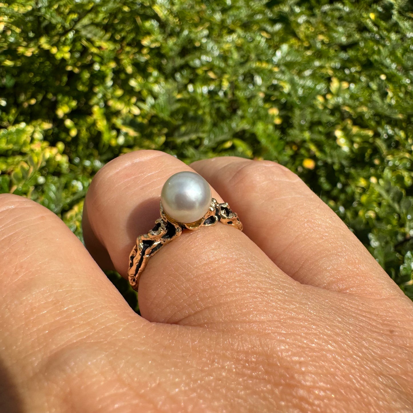 14K gold ring set a luminous white Pearl set on an ornate yellow gold band