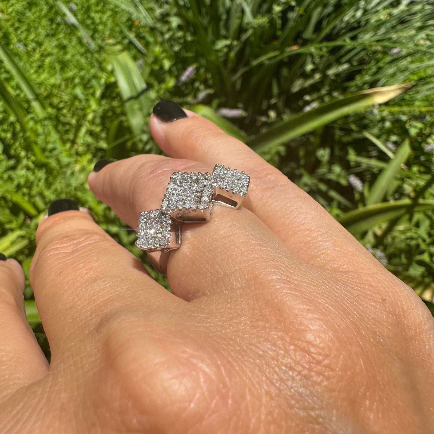 14K gold ring with three square clusters of sparkling Diamonds