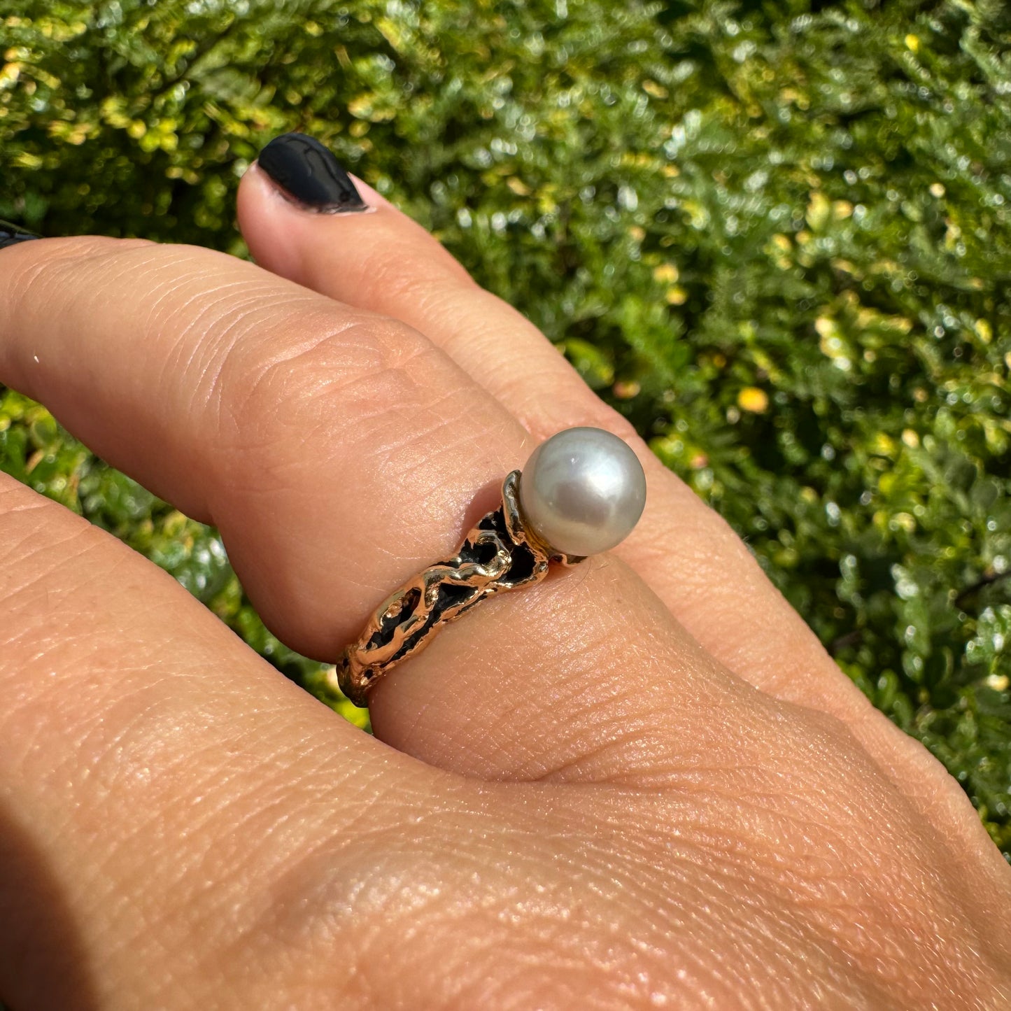 14K gold ring set a luminous white Pearl set on an ornate yellow gold band