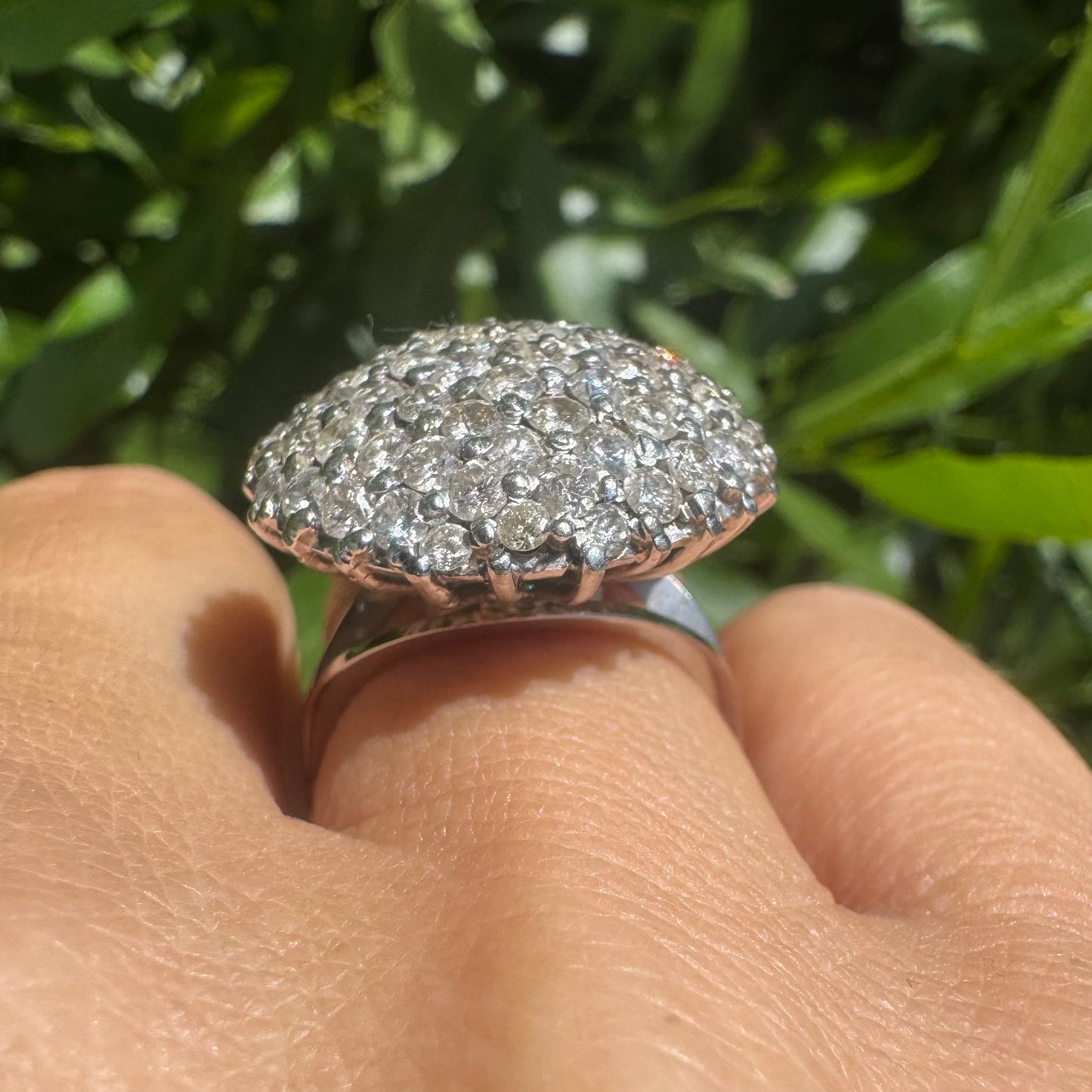 18K gold ring set with Diamonds in a bold pavé setting.