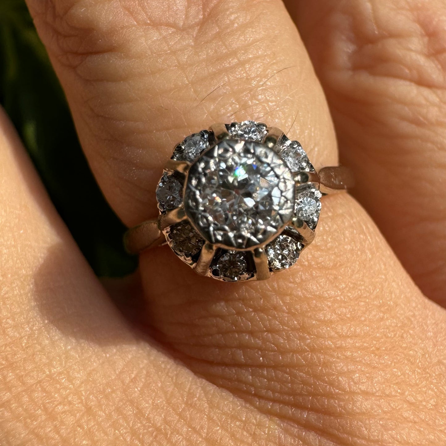 18K gold ring set with Diamonds in     a classic cluster-style