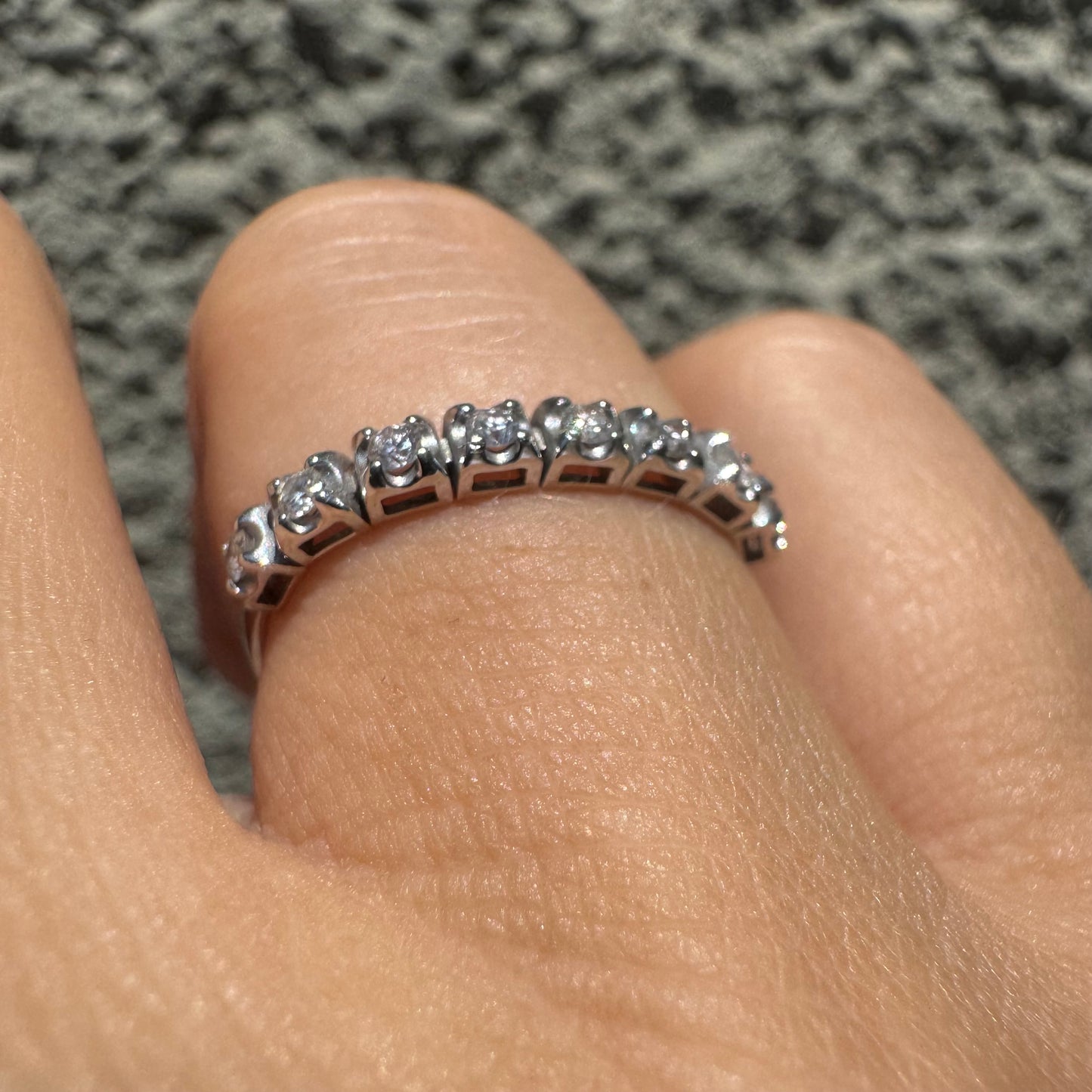 14K gold ring set with a row of sparkling Diamonds