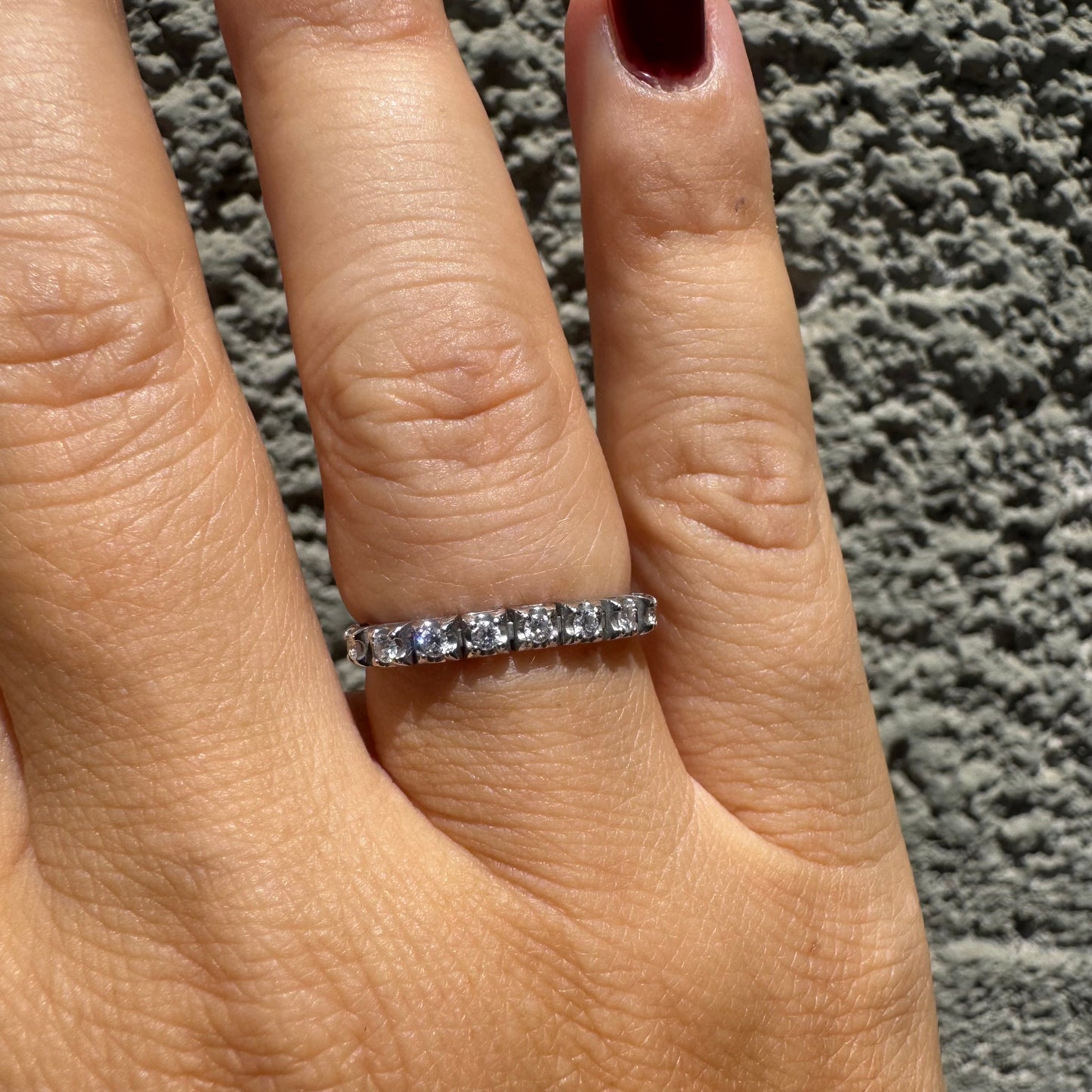 14K gold ring set with a row of sparkling Diamonds