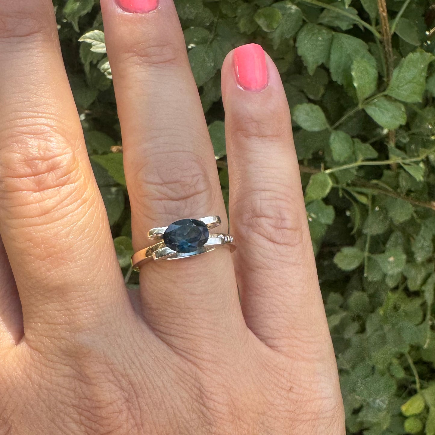 14K gold ring set with an oval-cut Blue Topaz “London”