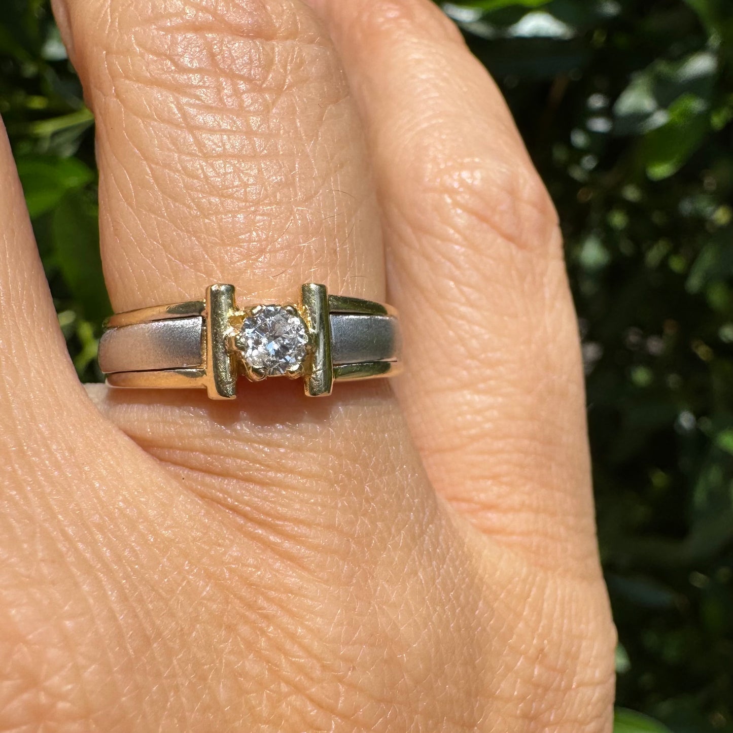 14K two-tone gold ring set with one center Diamond