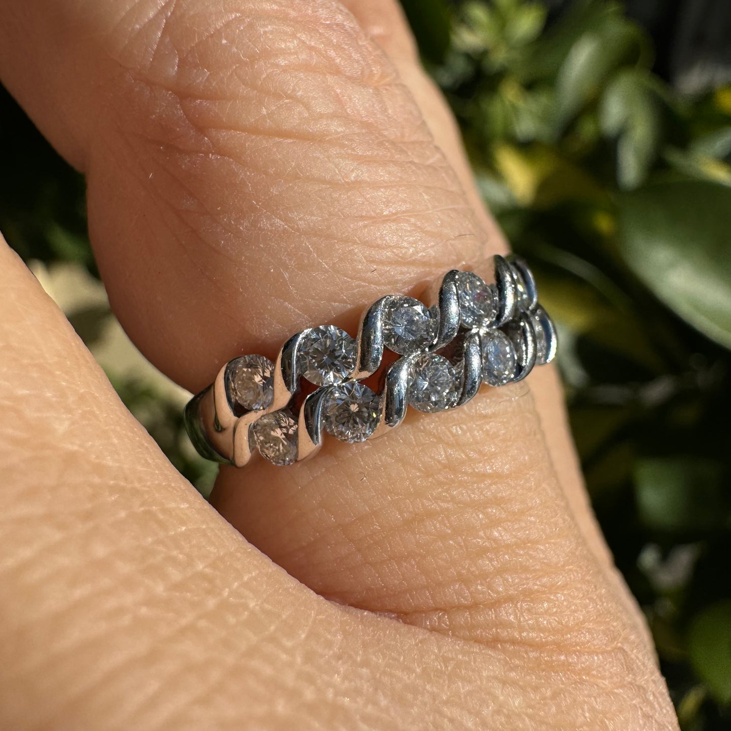 14K gold ring set with two rows of brilliant-cut Diamonds.