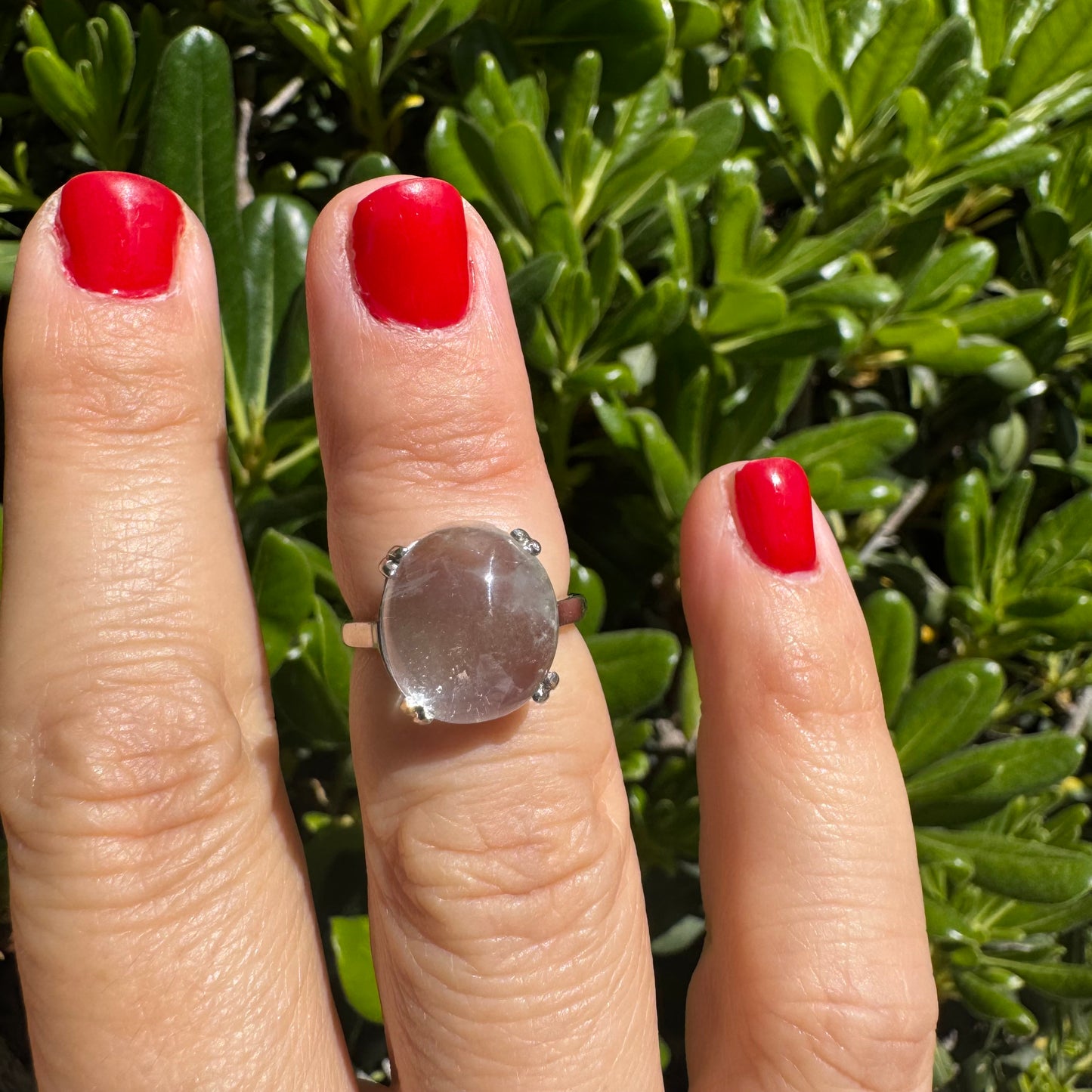Palladium ring set with a large clear Rock Crystal cabochon.