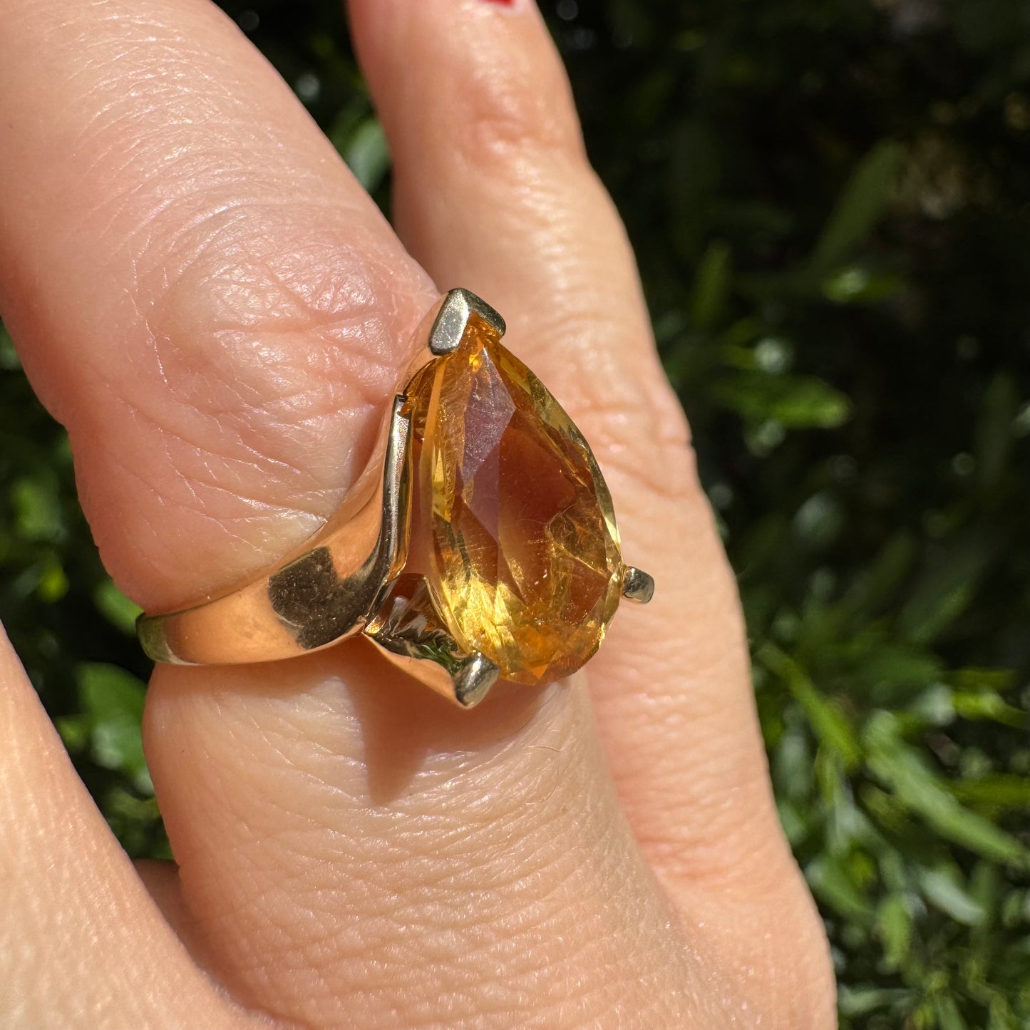 14K gold ring set with a large pear-shaped Citrine