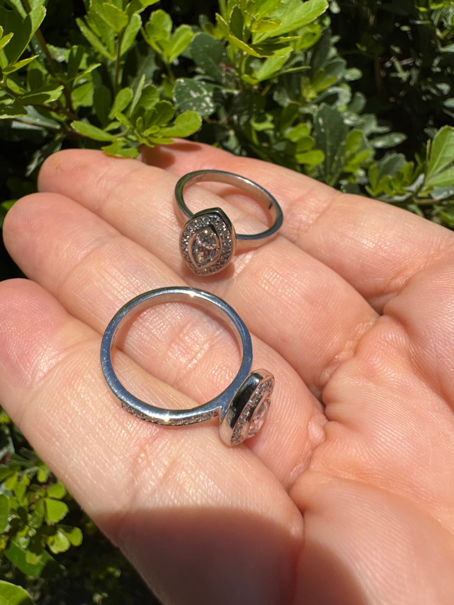 18K gold convertible ring set with two marquise-cut diamond halos that magnetically connect into a bold statement piece