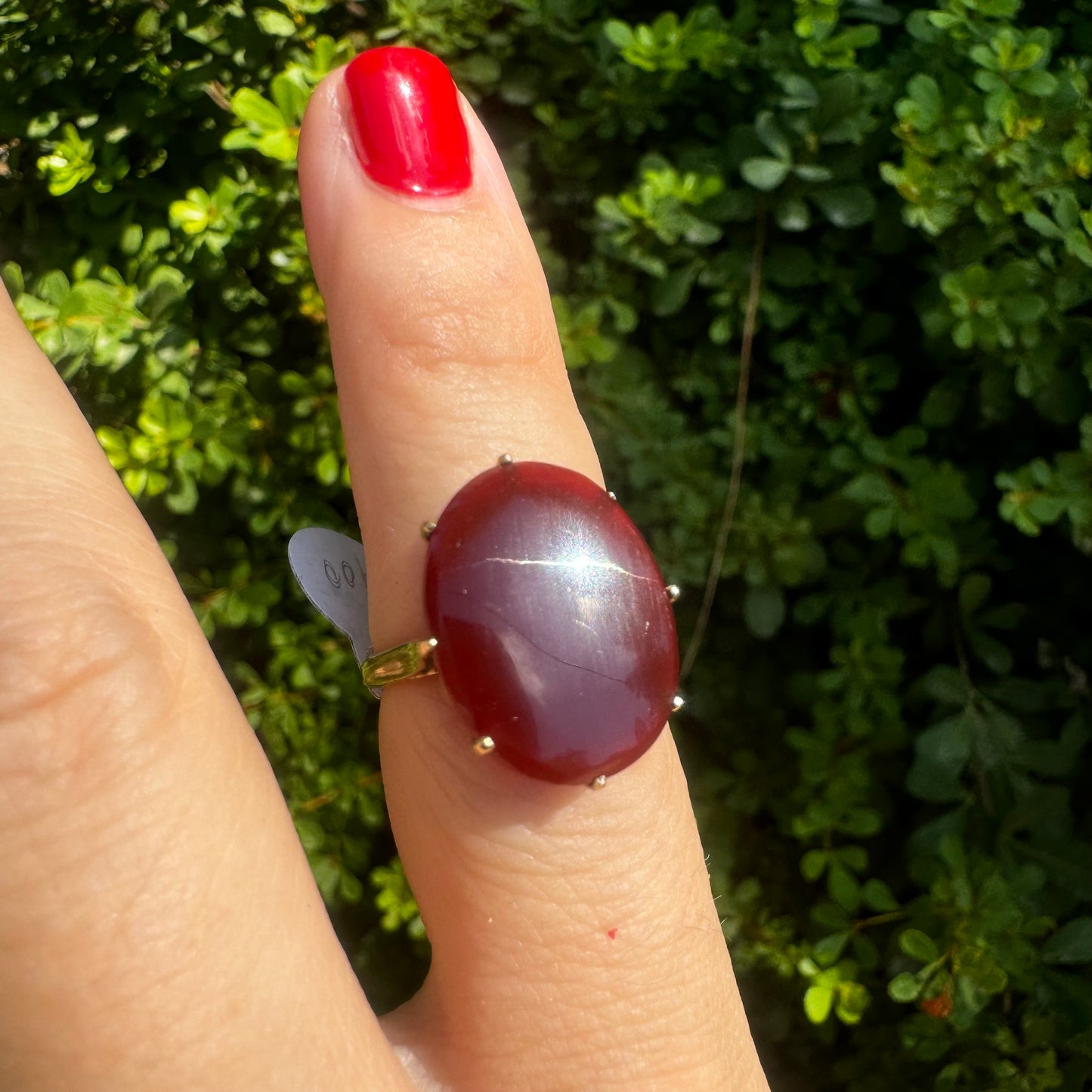 14K gold ring set with a glowing oval Carnelian