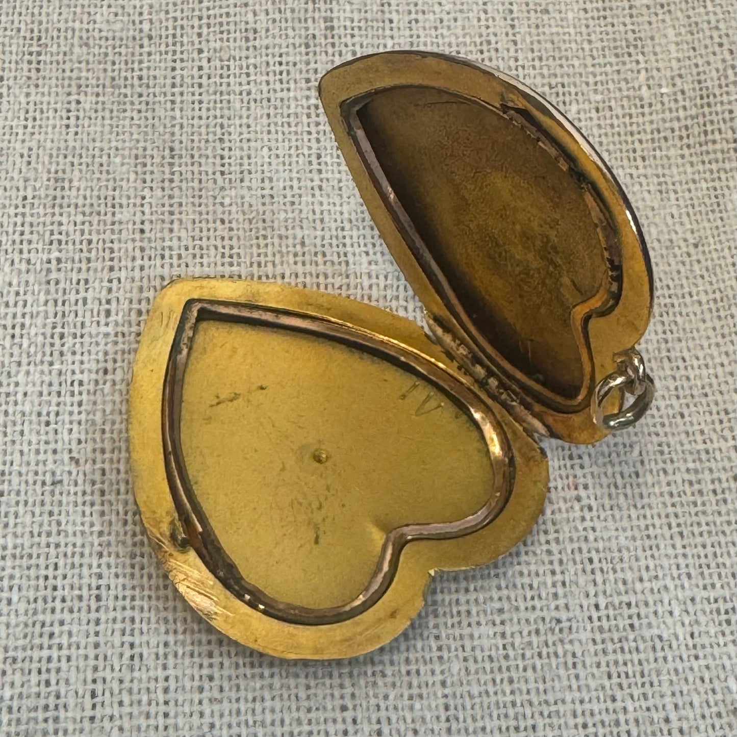 14K gold heart locket in smooth, polished gold tone