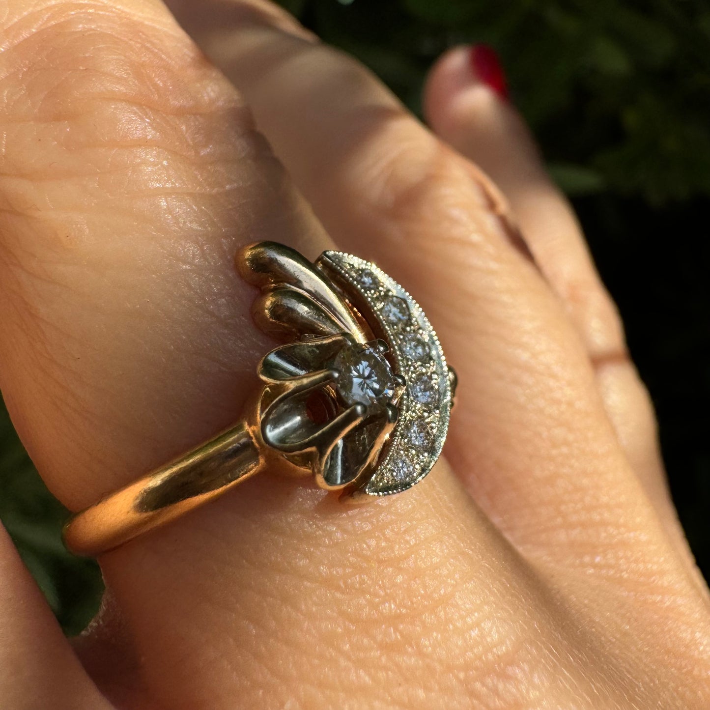 14K gold ring with a delicate moon and star motif set with Diamonds