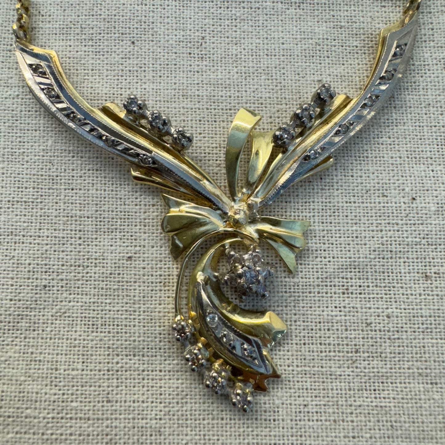 18K two-tone vintage necklace with a unique and elegant design set with Diamonds
