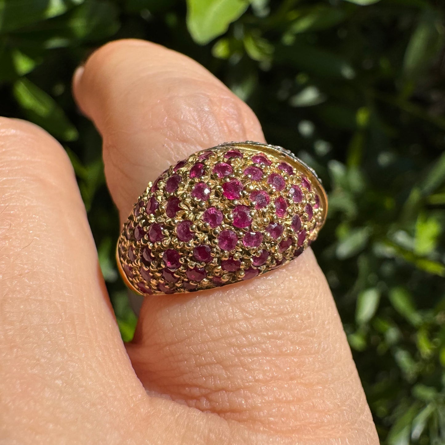 14K gold dome ring pavé-set with Diamonds and vivid Rubies in a striking two-tone design