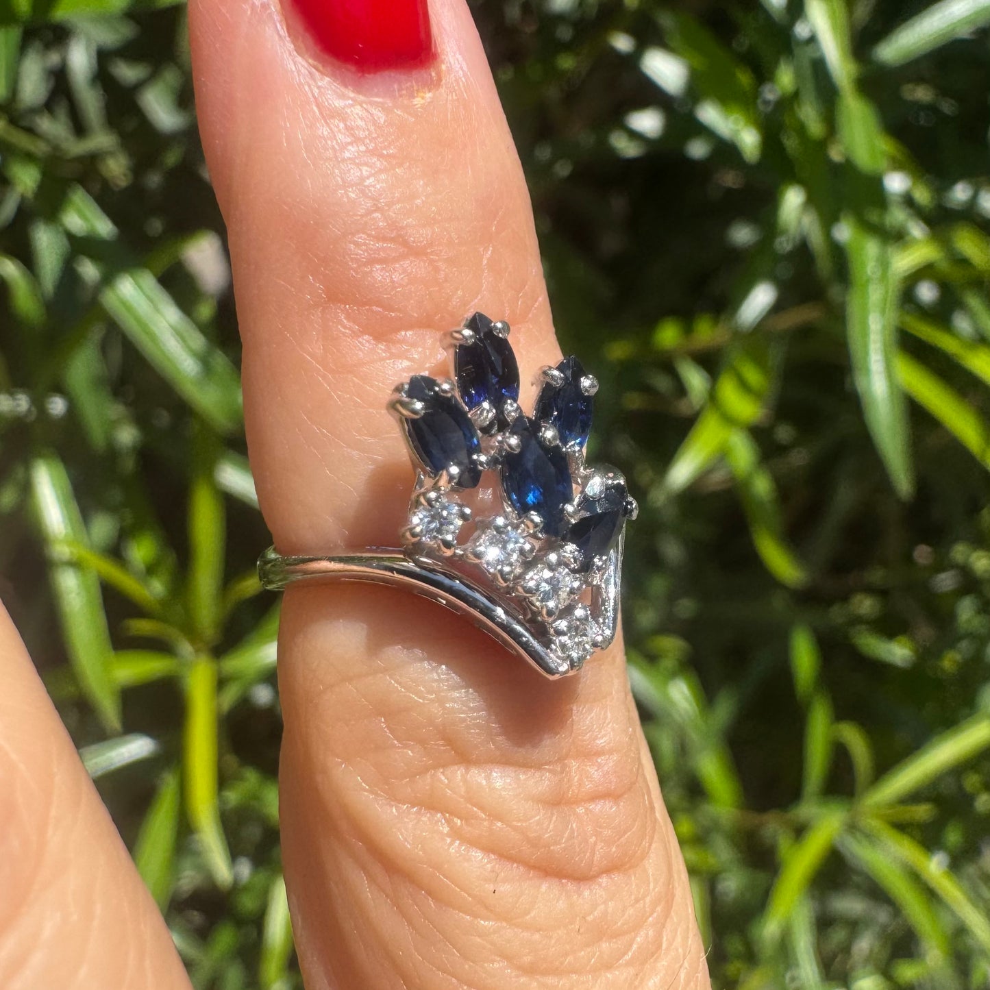 14K gold ring set with marquise-cut deep blue sapphires & Diamonds