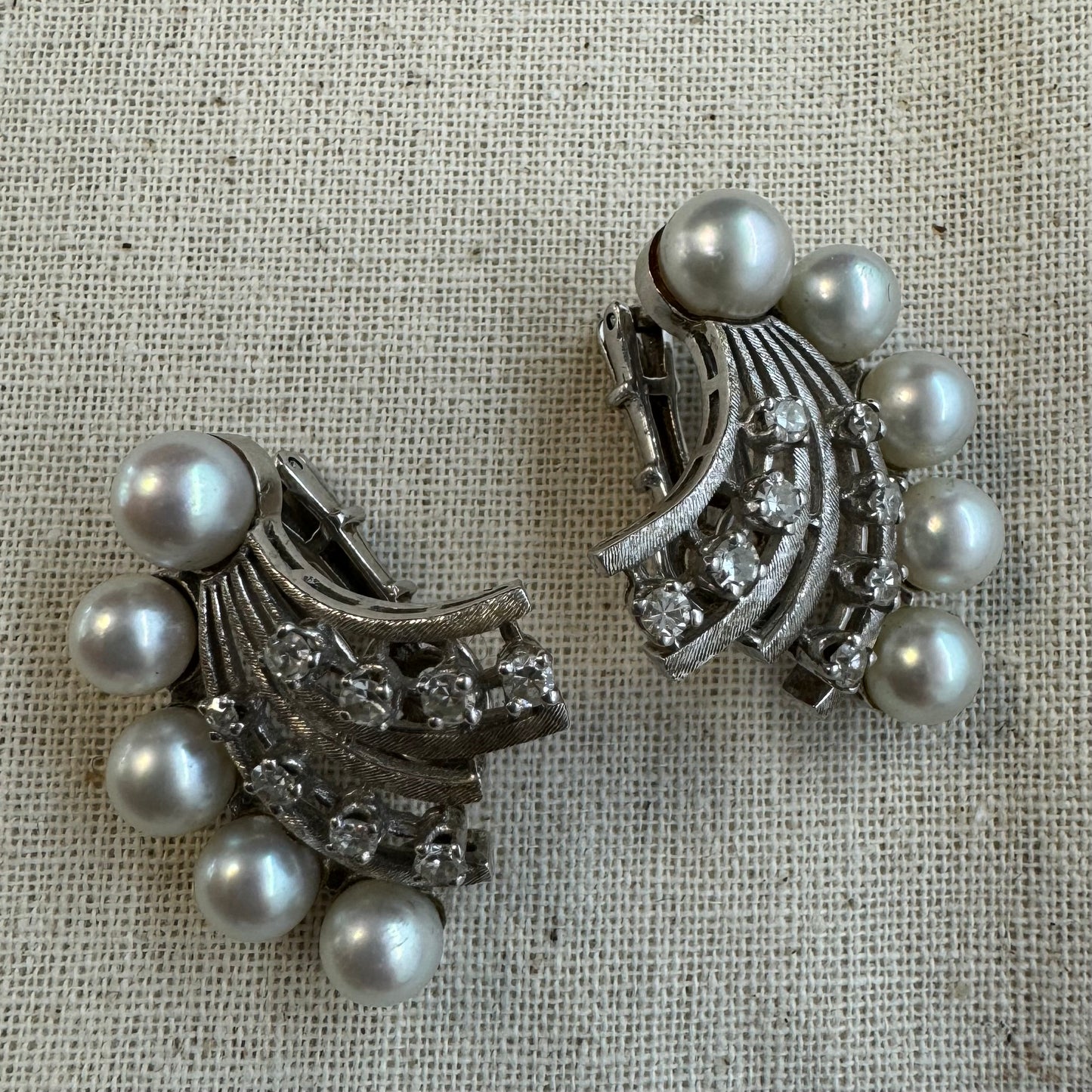 14K gold clip-on earrings set with lustrous pearls & sparkling Diamonds