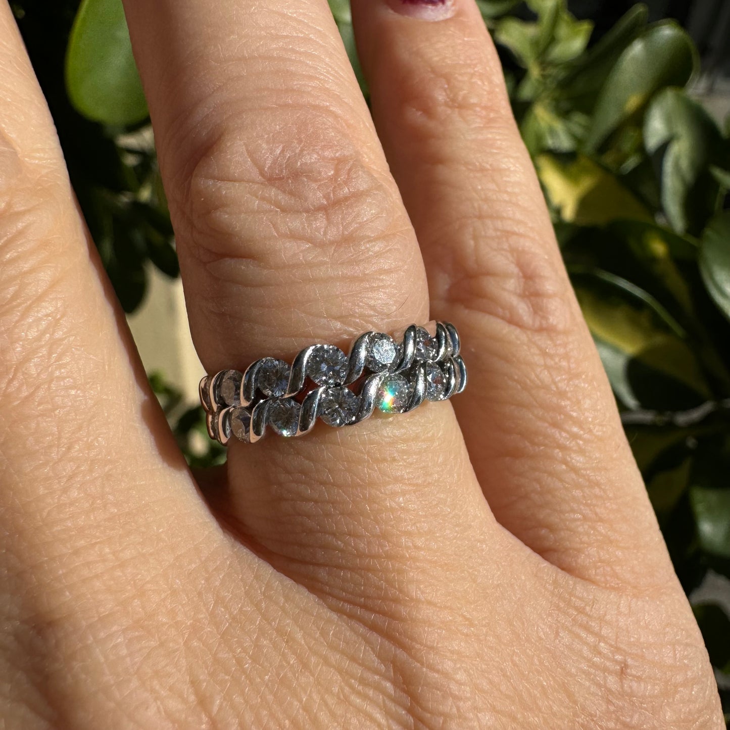 14K gold ring set with two rows of brilliant-cut Diamonds.