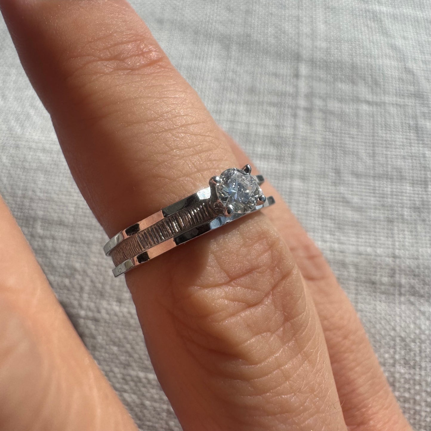 14K gold ring set with one center Diamond