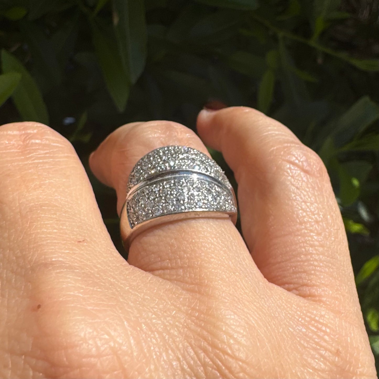 18K gold bold dome ring set with rows of brilliant pavé-set Diamonds