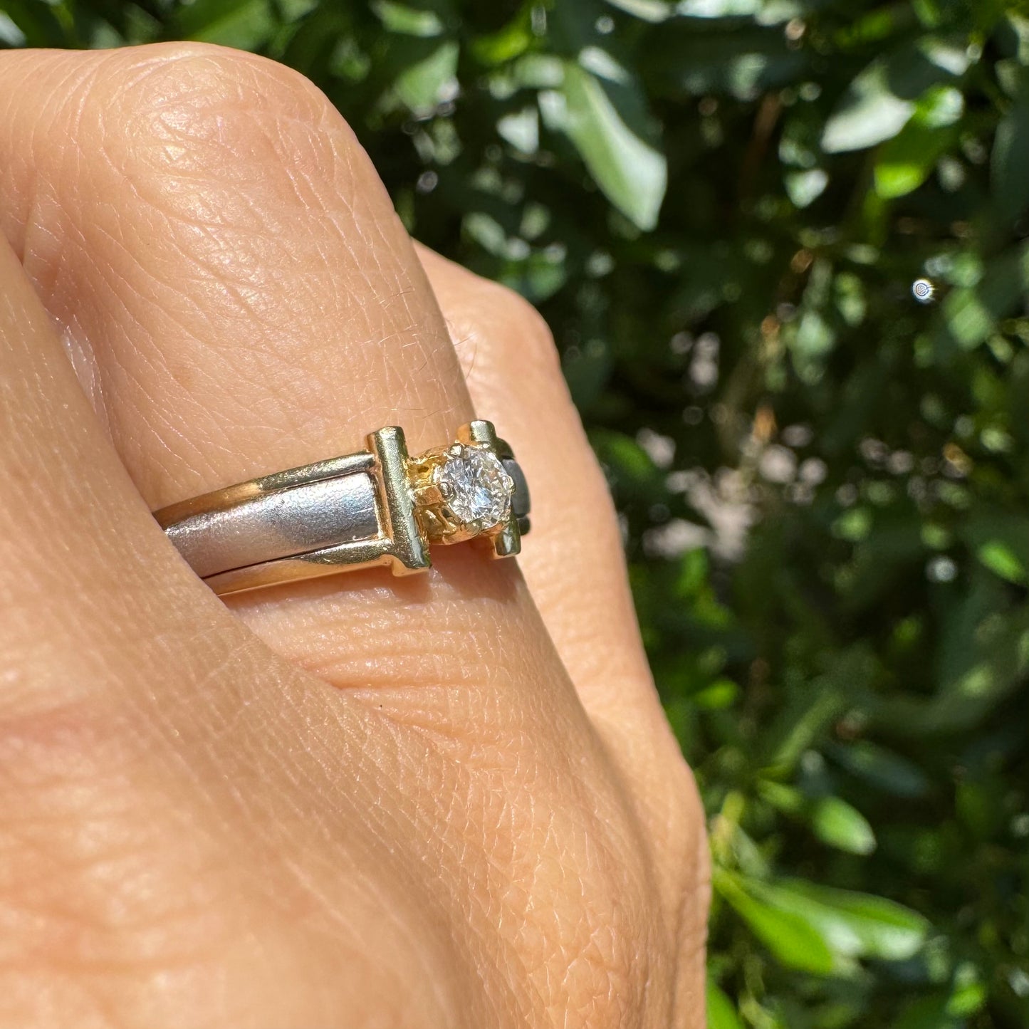 14K two-tone gold ring set with one center Diamond