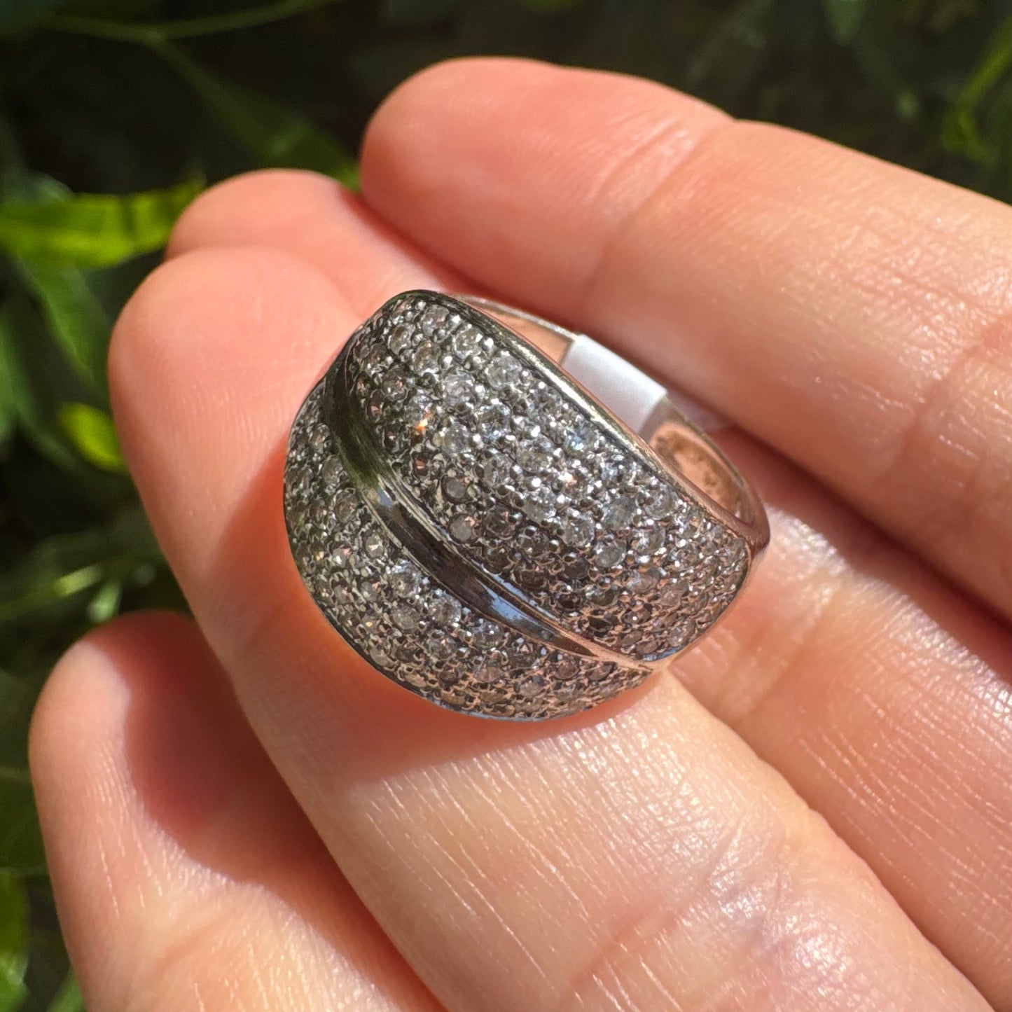 18K gold bold dome ring set with rows of brilliant pavé-set Diamonds