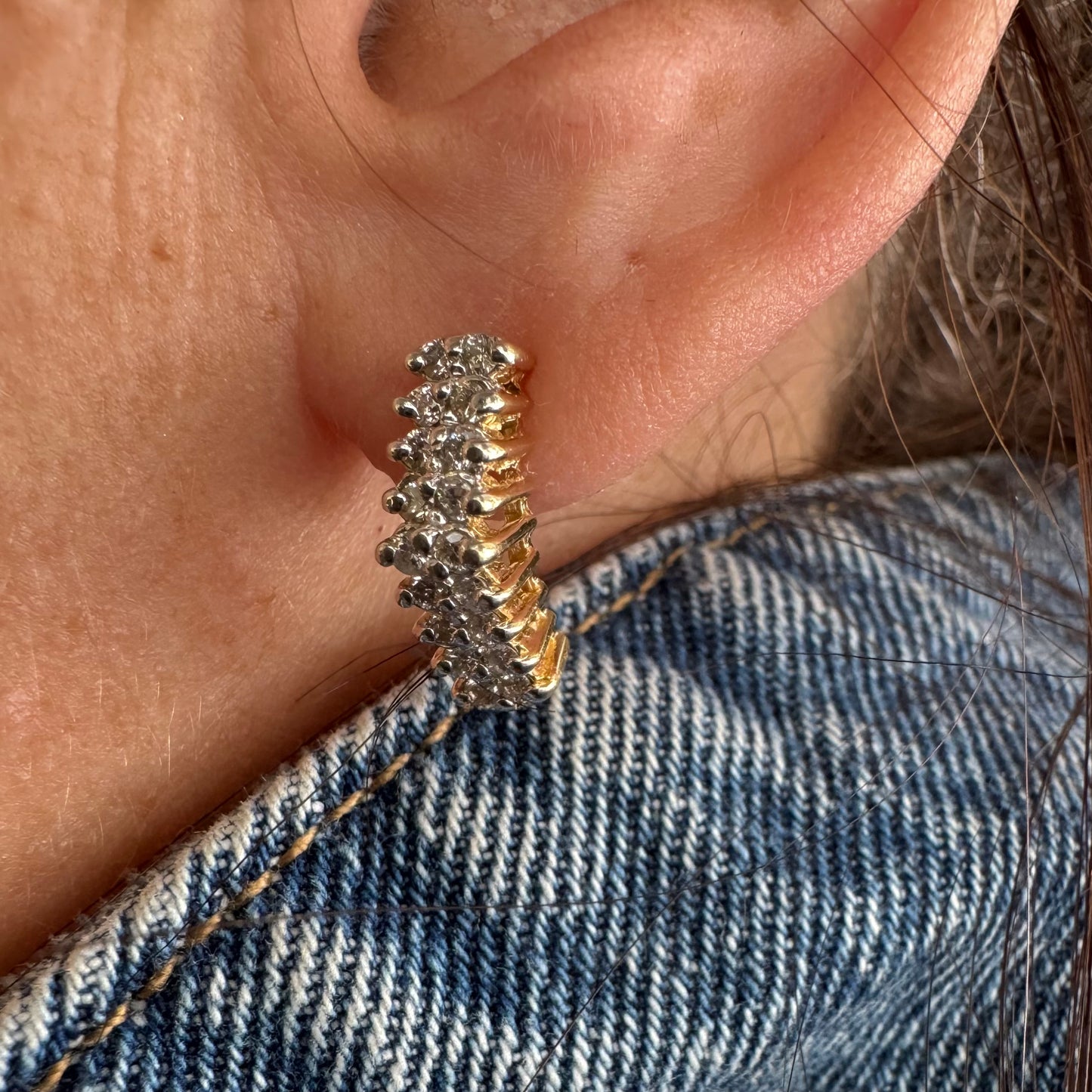 14K gold half-hoop earrings set with sparkling Diamonds in a dense pavé setting