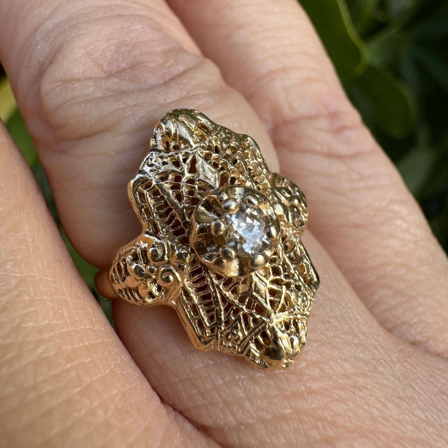 14K gold filigree ring set with an old-cut Diamond
