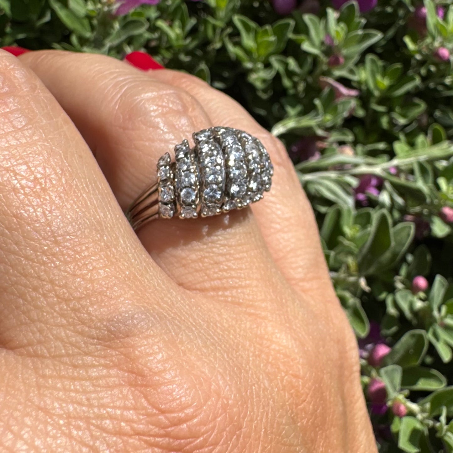 18K gold ring set with rows of sparkling Diamonds in a bold, sculptural design